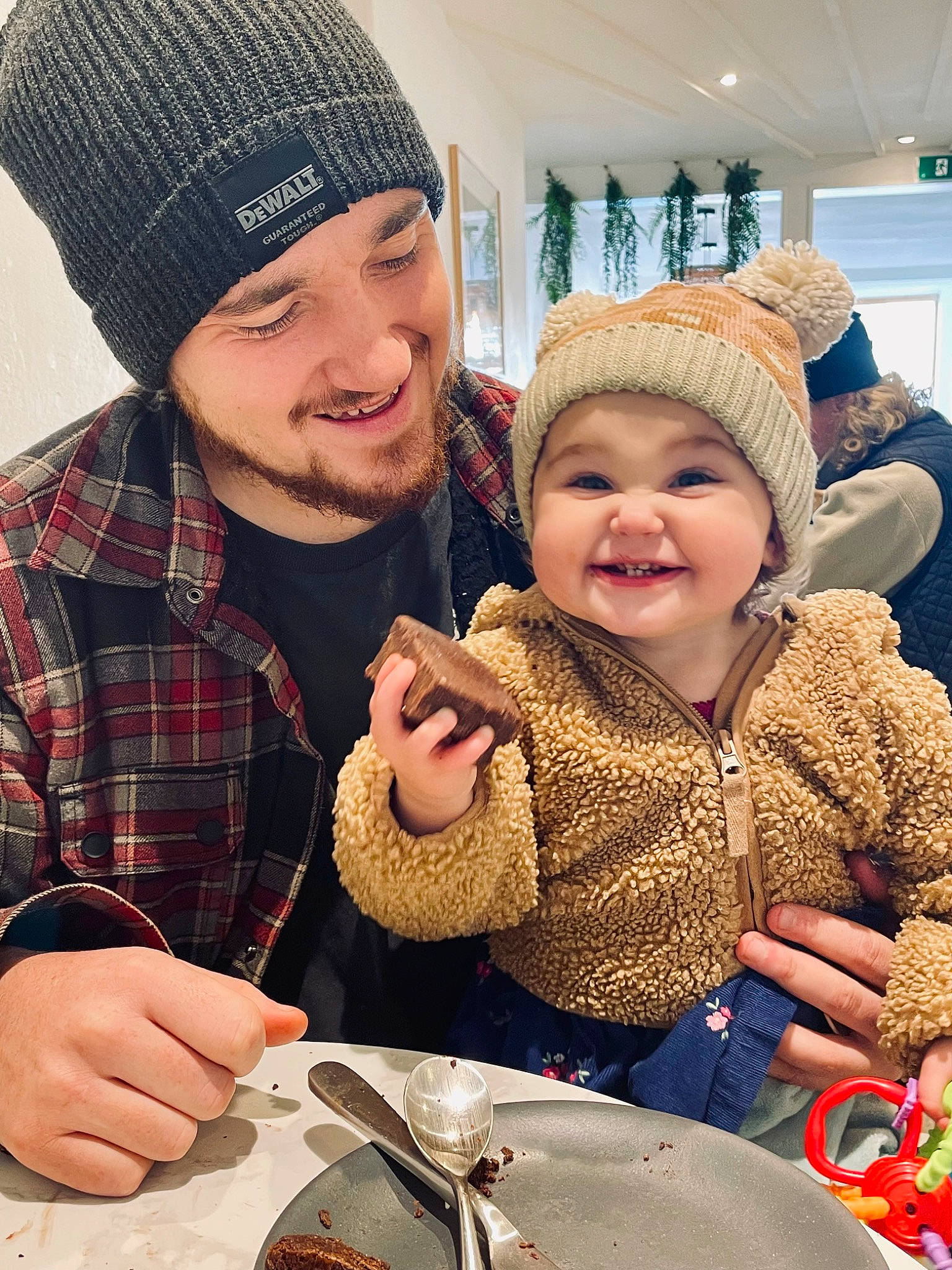 Isla-mae joined the competition — help win amazing prizes! beard, cap, eye, face, facial_expression, fun, happy, head, headgear, headwear, human_body, jacket, joy, people, person, plate, sharing, skin, smile, table