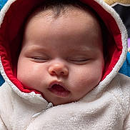 Anaya a rejoint le concours — aidez-le/la à gagner de superbes lots ! baby, infant, sleeping, hood, hoodie, reindeer_antlers, plush, zipper, chubby_cheeks, closed_eyes, portrait, close_up, soft_texture, cozy, cuddly, winter_clothing, adorable, indoor, face, skin