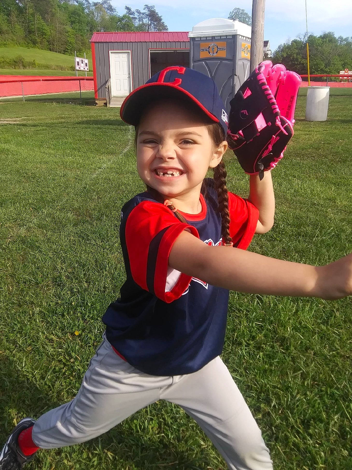 Nevaeh is registered to the contest to win money with this photo: baseball, baseball_equipment, baseball_field, baseball_glove, baseball_player, baseball_uniform, bat_and_ball_games, cap, fun, grass, happy, headwear, jersey, joy, person, player, sky, smile, sports, sports_gear