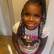 Alailah joined the competition — help win amazing prizes! blackhair, bodypart, braid, child, clothing, cornrows, dimples, door, face, female, girl, hair, happy, head, person, photography, portrait, sleeve, smile, t_shirt
