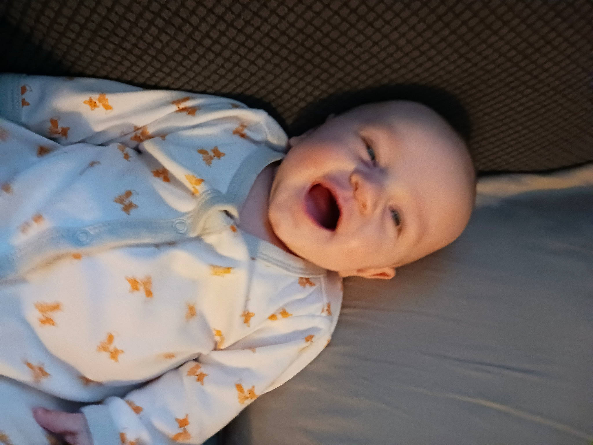 Harrison is registered to the contest to win money with this photo: baby, baby_toddler_clothing, cheek, child, collar, comfort, linens, lip, nose, pattern, person, skin, sleeve, toddler