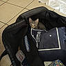 Blue a rejoint le concours — aidez-le/la à gagner de superbes lots ! kitten, cat, travel_bag, clothes, tile_floor, blue_pouch, curious, indoor, pet, small, domestic_animal, black_bag, packing, towel, striped, young, container, floor, peek, hidden