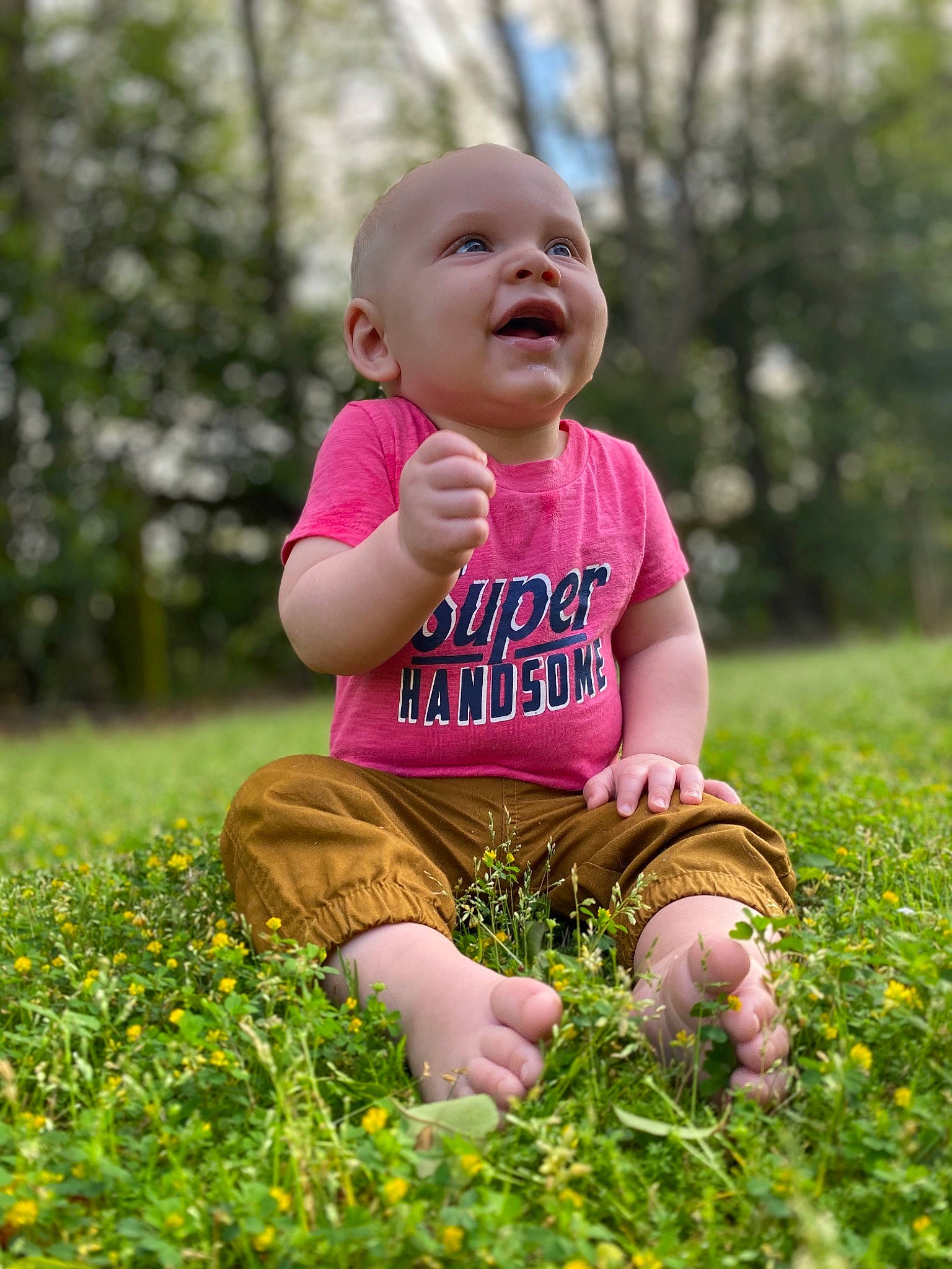 Reed is registered to the contest to win money with this photo: baby, child, finger, fun, grass, grass_family, happy, lawn, meadow, people_in_nature, person, photography, plant, play, sitting, skin, smile, spring, toddler