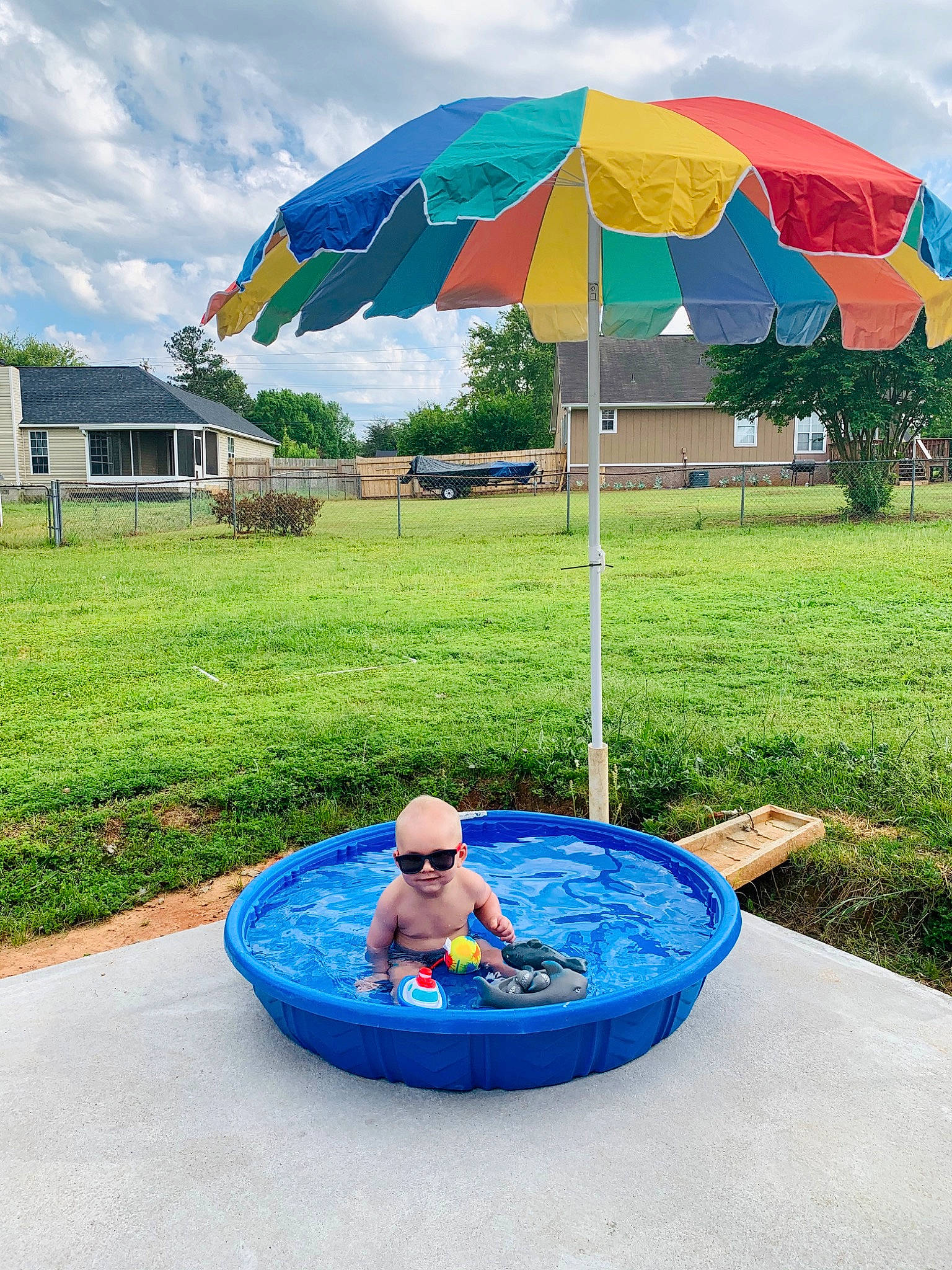Reed joined the competition — help win amazing prizes! child, fashion_accessory, fun, leisure, park, person, play, recreation, shade, summer, swimming_pool, umbrella, vacation, water