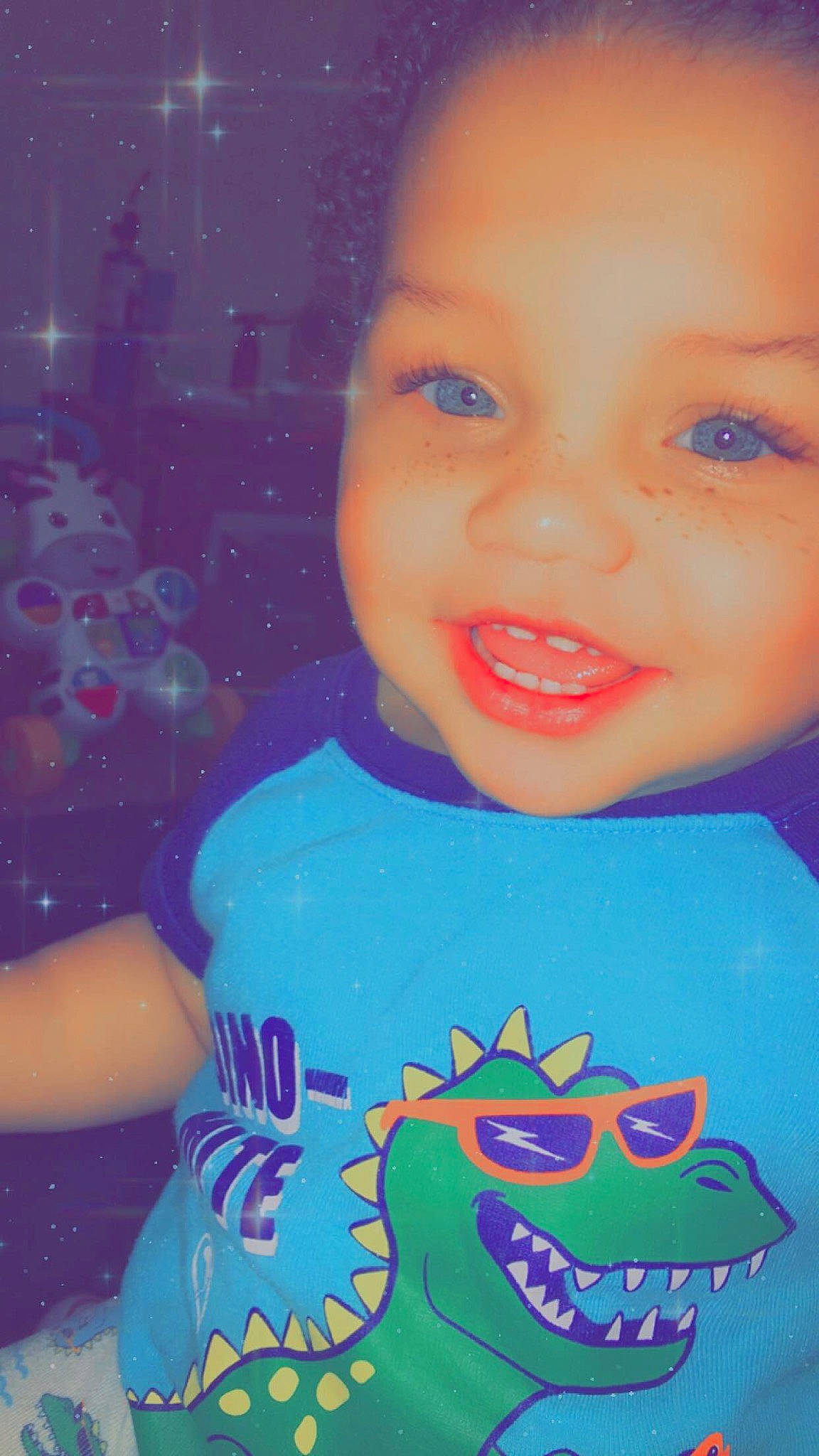 Coby is registered to the contest to win money with this photo: blue, cheek, child, cool, eye, face, facial_expression, fun, happy, head, lip, person, pink, purple, skin, smile, toddler