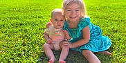Paislee is registered to the contest to win money with this photo: baby, child, grass, outdoor, sunlight, smiling, happy, girl, toddler, clothing, dress, sitting, nature, greenery, daylight, cute, family, portrait, person, playful