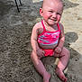 Harley joined the competition — help win amazing prizes! baby, child, sand, beach, swimsuit, pink, smiling, sitting, sunlight, summer, outdoor, barefoot, cute, fun, playful, sunny, happy, skin, head, person
