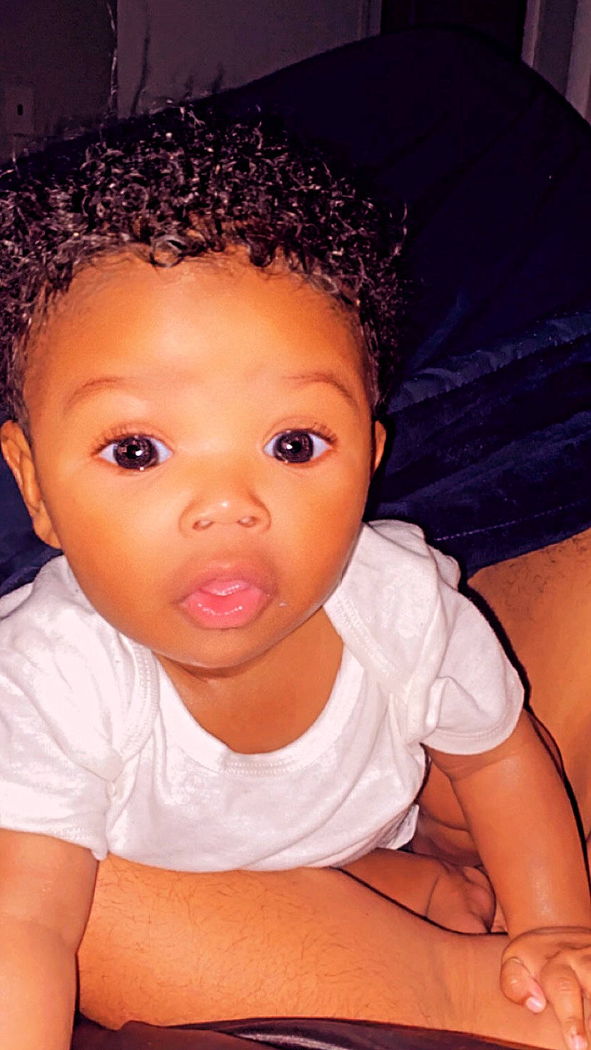 Jakari is registered to the contest to win money with this photo: afro, black_hair, cheek, chin, cool, ear, eye, eyebrow, eyelash, facial_expression, flash_photography, forehead, fun, hairstyle, iris, jheri_curl, lip, nose, person, skin