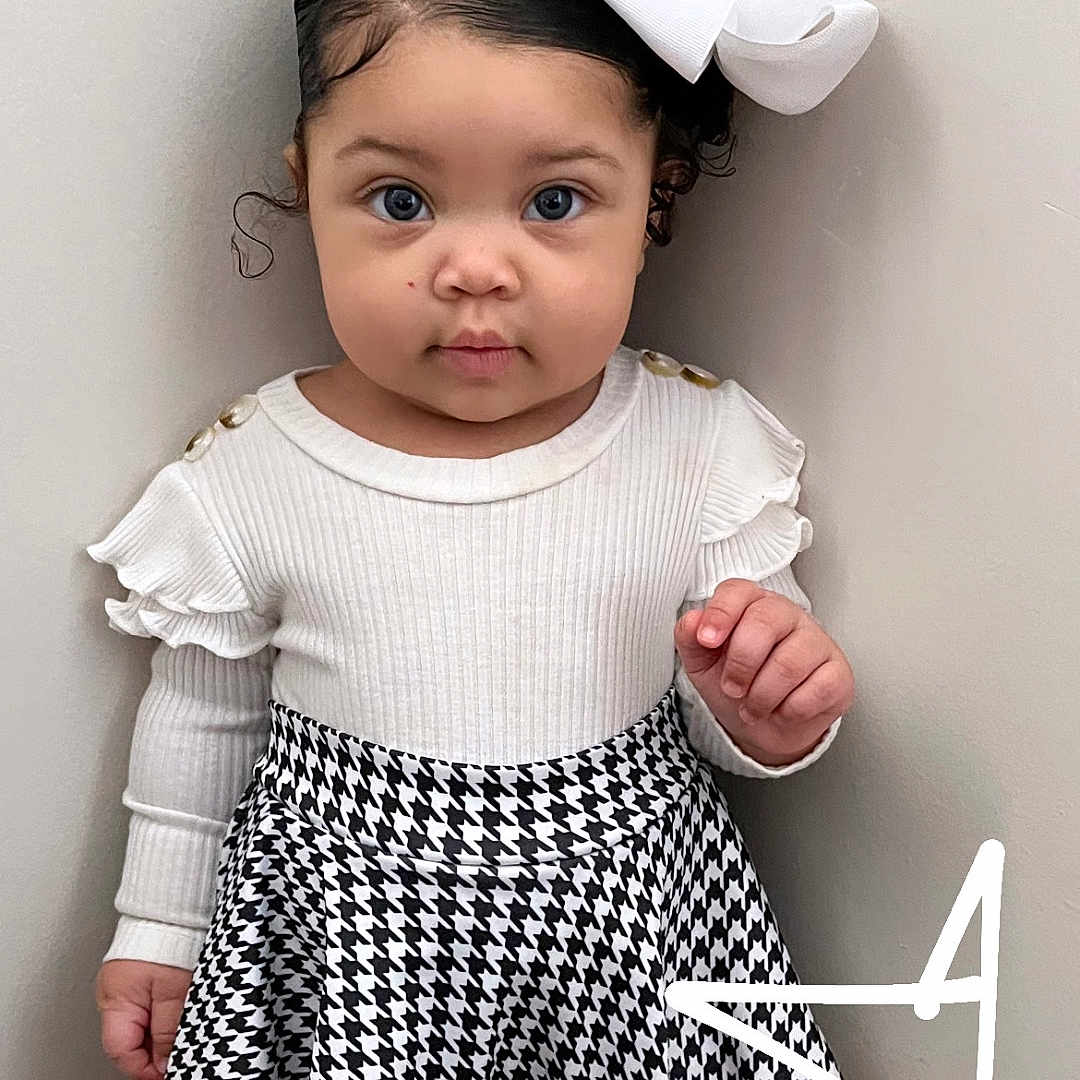 Kaveya joined the competition — help win amazing prizes! baby, blackhair, bodypart, clothing, dress, face, finger, hair, hand, head, miniskirt, person, photography, portrait, shorts, skirt, sleeve, standing, symbol, text