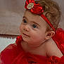 Kataléa participe au concours pour gagner de l'argent avec cette photo : baby, child, red_dress, headband, blue_eyes, portrait, cute, infant, soft, fabric, sparkle, jewel, face, skin, hair, tulle, lying_down, closeup, expression, adorable
