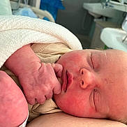 June is registered to the contest to win money with this photo: newborn, baby, sleeping, infant, blanket, hospital, hand, face, skin, cozy, closeup, peaceful, resting, cute, child, person, soft, wrapped, indoors, newborn_baby