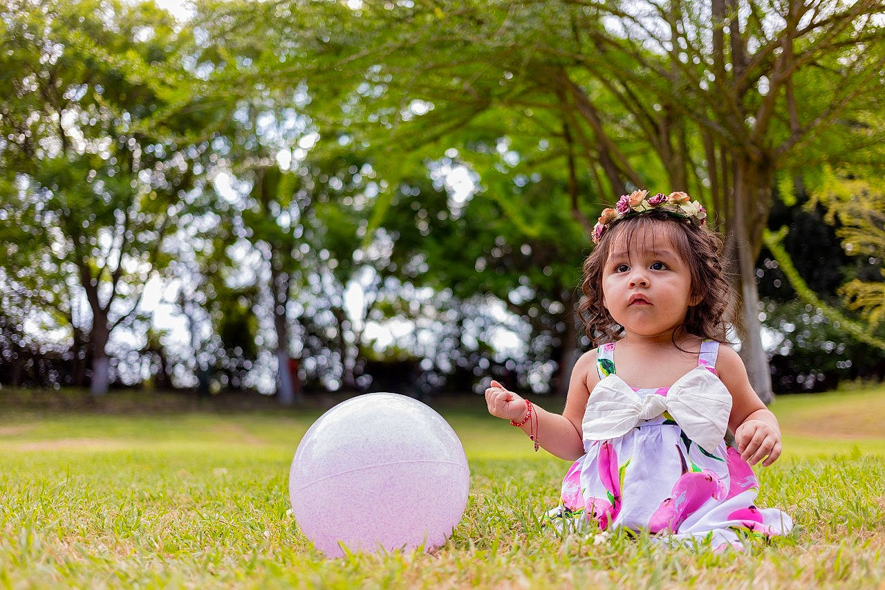 Jayleen is registered to the contest to win money with this photo: ball, balloon, child, dress, fun, grass, happy, meadow, people_in_nature, person, photograph, photography, pink, play, playing_with_kids, recreation, spring, summer, sunlight, toddler