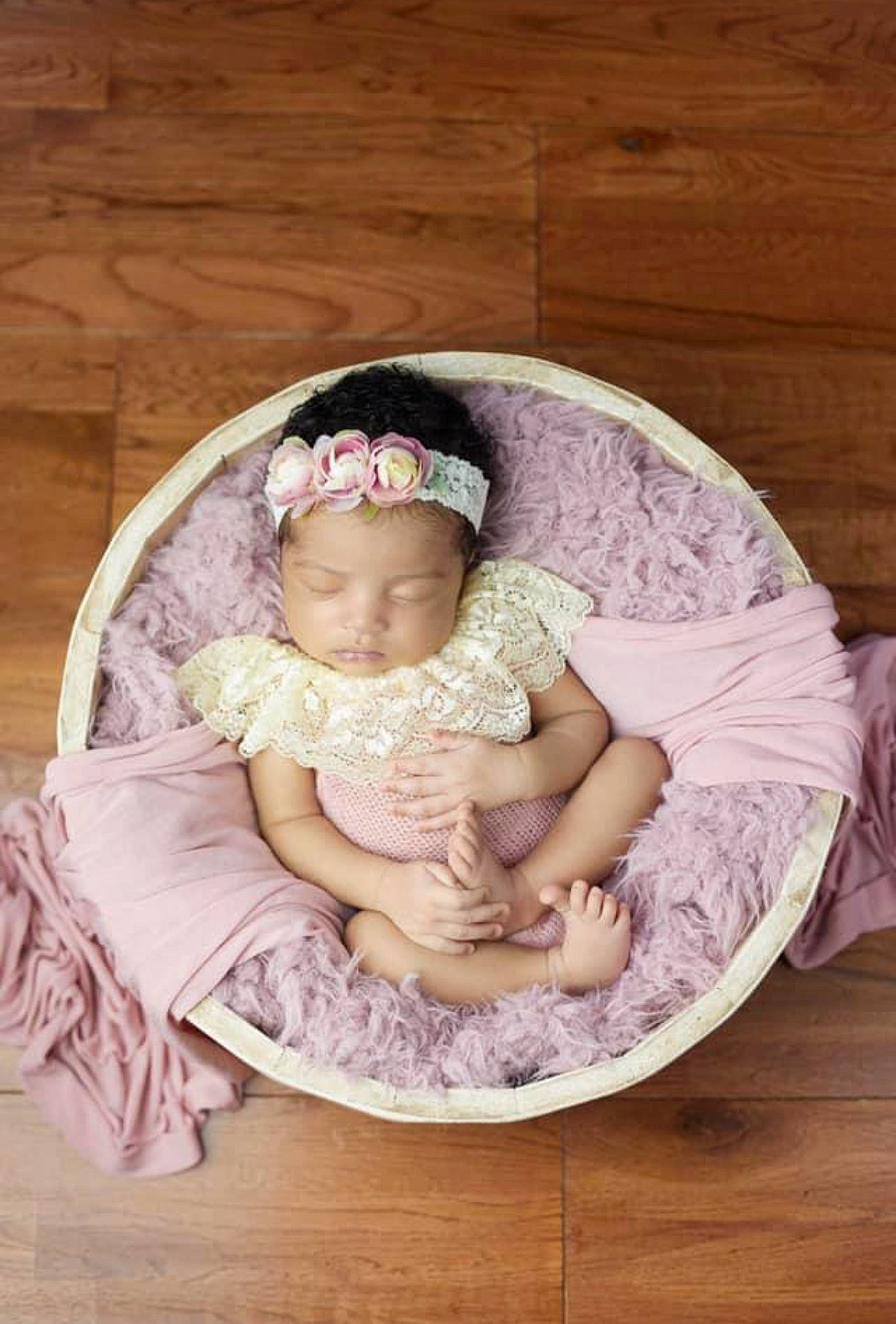 Zuri is registered to the contest to win money with this photo: baby, baby_products, baby_toddler_clothing, child, comfort, embellishment, fashion_accessory, grass, hair_accessory, happy, headband, headgear, headpiece, pattern, peach, person, pink, purple, sitting, toddler