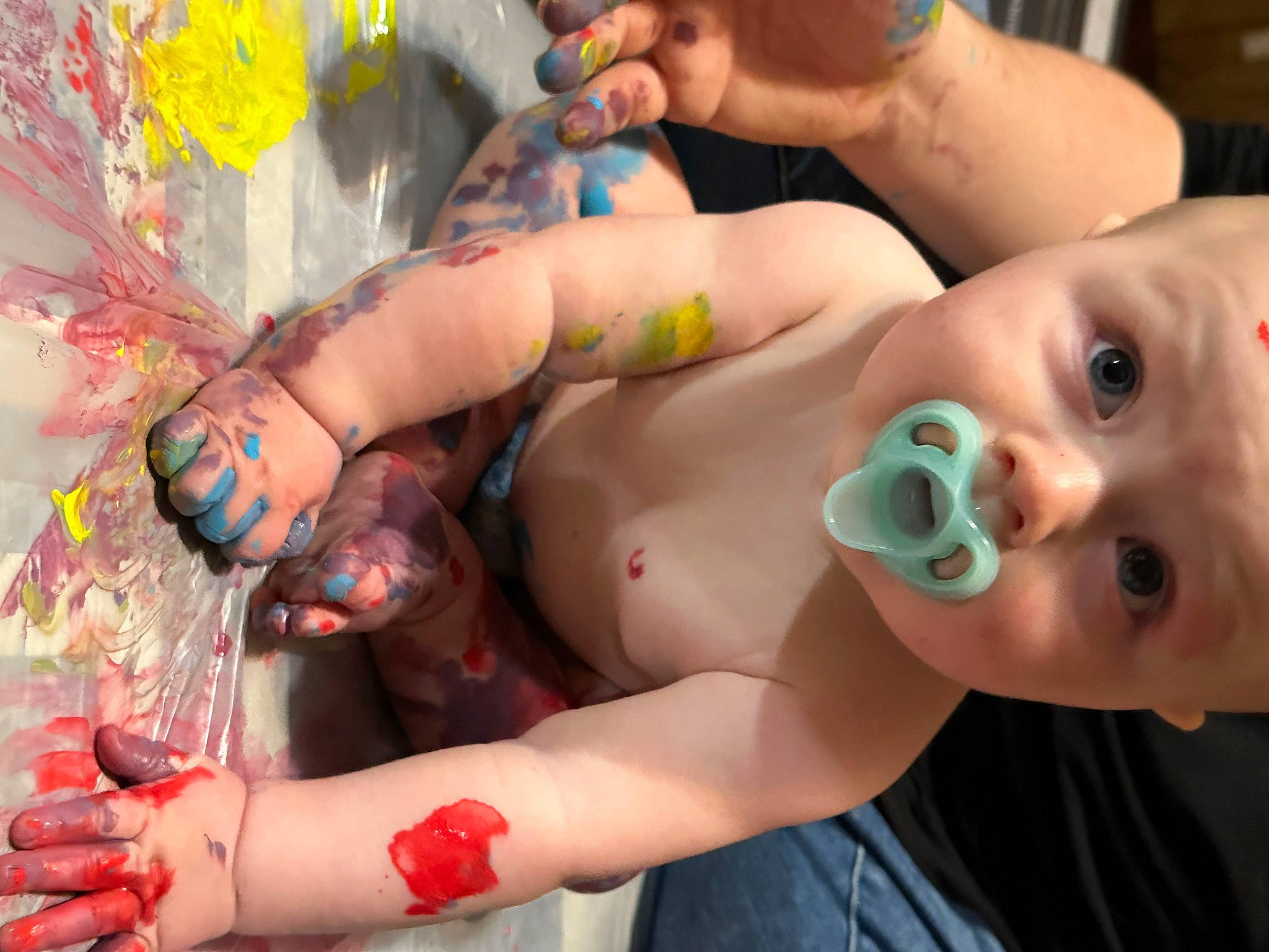 Riley is registered to the contest to win money with this photo: baby, chest, eyelash, eyewear, finger, fun, hand, happy, headwear, human_leg, leisure, mouth, muscle, nail, person, skin, summer, thigh, thumb, toddler