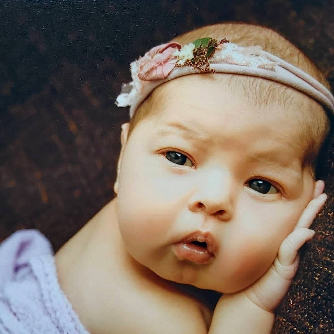 Murron is registered to the contest to win money with this photo: baby, beauty, cheek, child, chin, eye, eyebrow, face, fashion_accessory, forehead, hair_accessory, head, headband, headgear, headpiece, lip, mouth, nose, person, skin