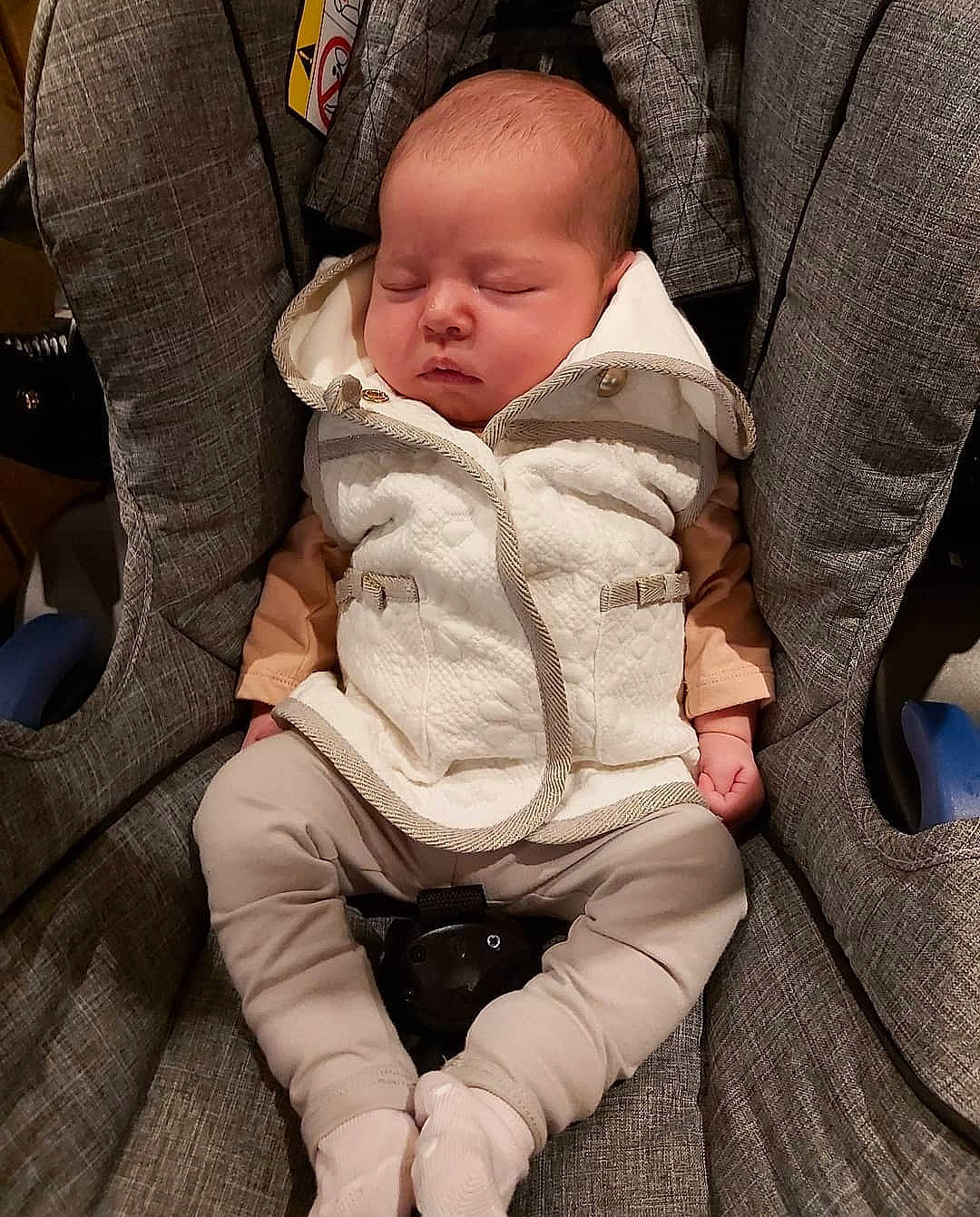 Murron is registered to the contest to win money with this photo: baby, baby_in_car_seat, baby_products, baby_sleeping, car_seat, cheek, child, comfort, person, sitting, skin, sleep, toddler