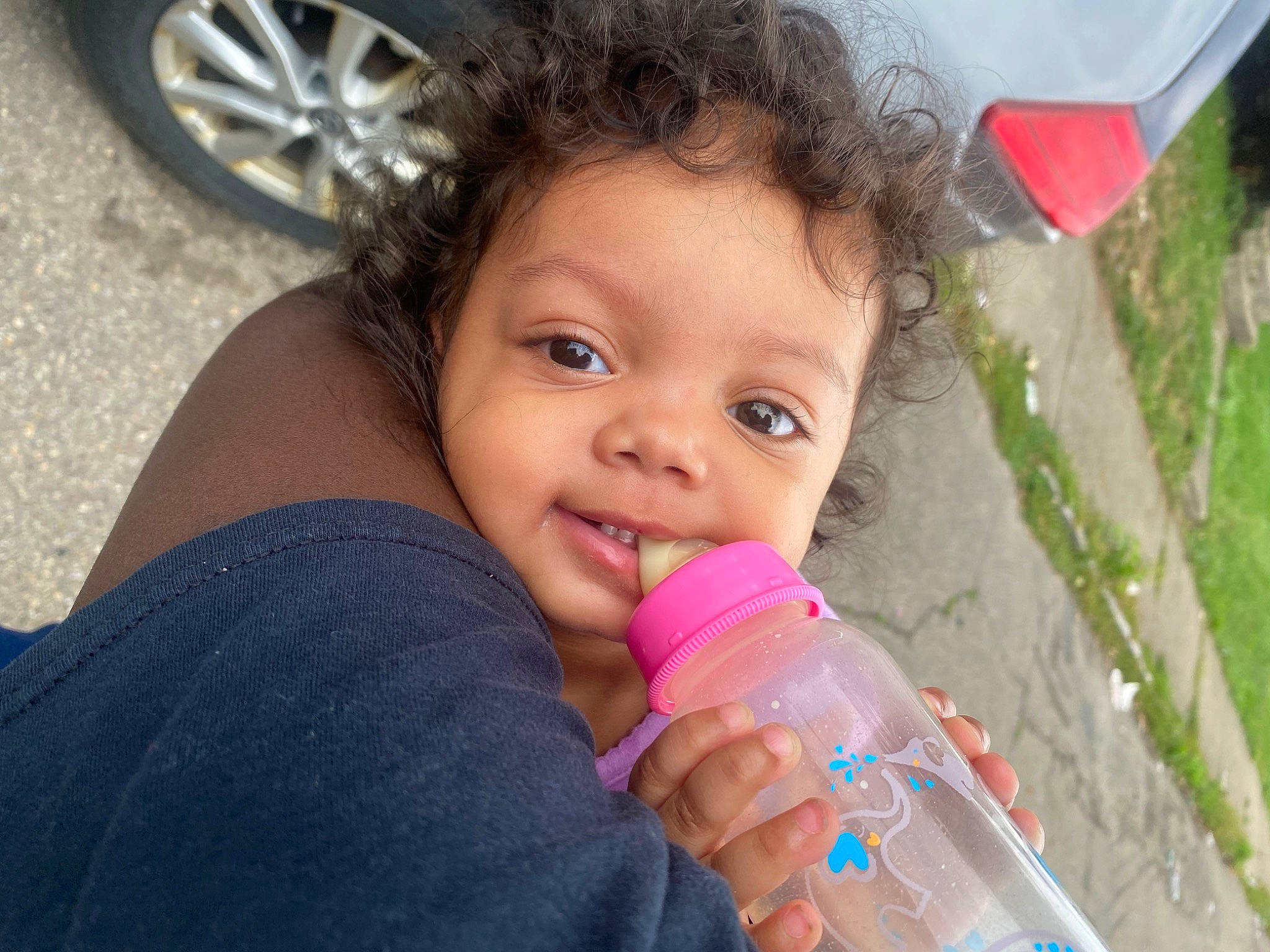 Xolani joined the competition — help win amazing prizes! automotive_tire, beauty, child, drinkware, eyelash, fun, happy, leisure, lip, nail, nose, person, pink, plastic_bottle, rim, skin, smile, summer, tire, toddler