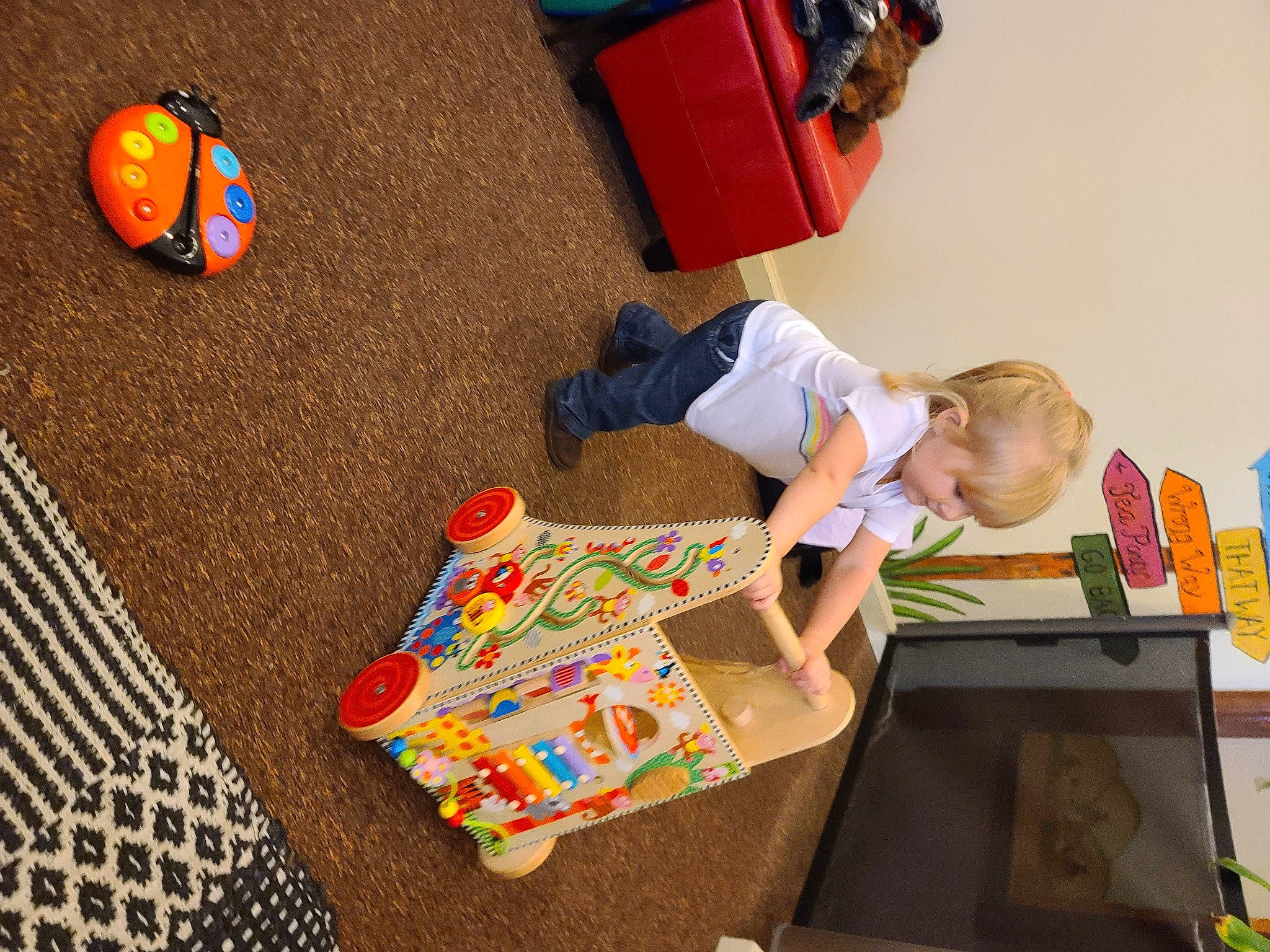 Amber joined the competition — help win amazing prizes! art, ball, box, child, flooring, fun, games, leisure, orange, pattern, person, play, recreation, room, sharing, sitting, toddler, toy, visual_arts, wood