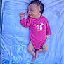 baby, newborn, sleeping, pink_onesie, pacifier, blanket, blue, infant, resting, cute, peaceful, soft, indoors, child, portrait, one_person, sleep, small_hands, small_feet, face