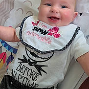 Magdalena is registered to the contest to win money with this photo: baby, smile, bib, tshirt, playmat, infant, happy, child, clothing, cute, face, person, indoors, cheerful, closeup, expression, sitting, colorful, toy, pattern