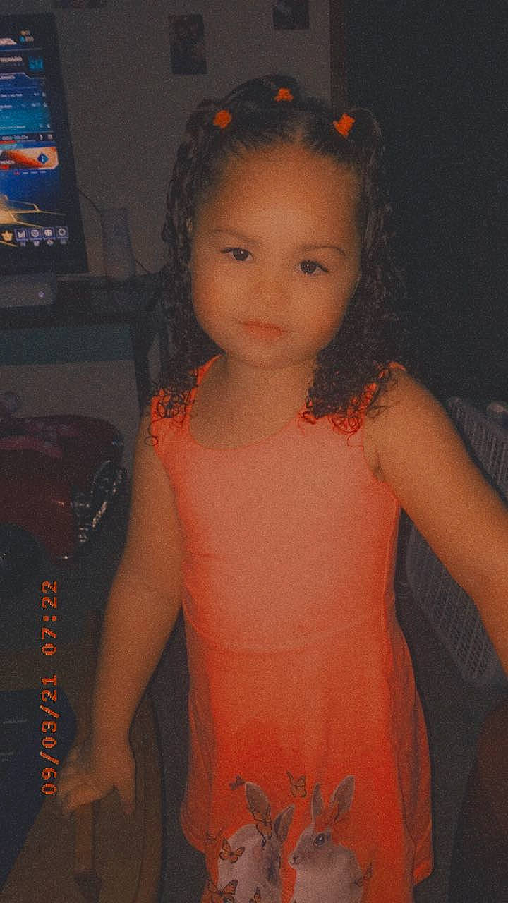 Meilani is registered to the contest to win money with this photo: black_hair, cheek, chest, chin, eye, eyebrow, facial_expression, flash_photography, hair, hairstyle, happy, iris, lip, neck, organ, person, shoulder, skin, standing, television