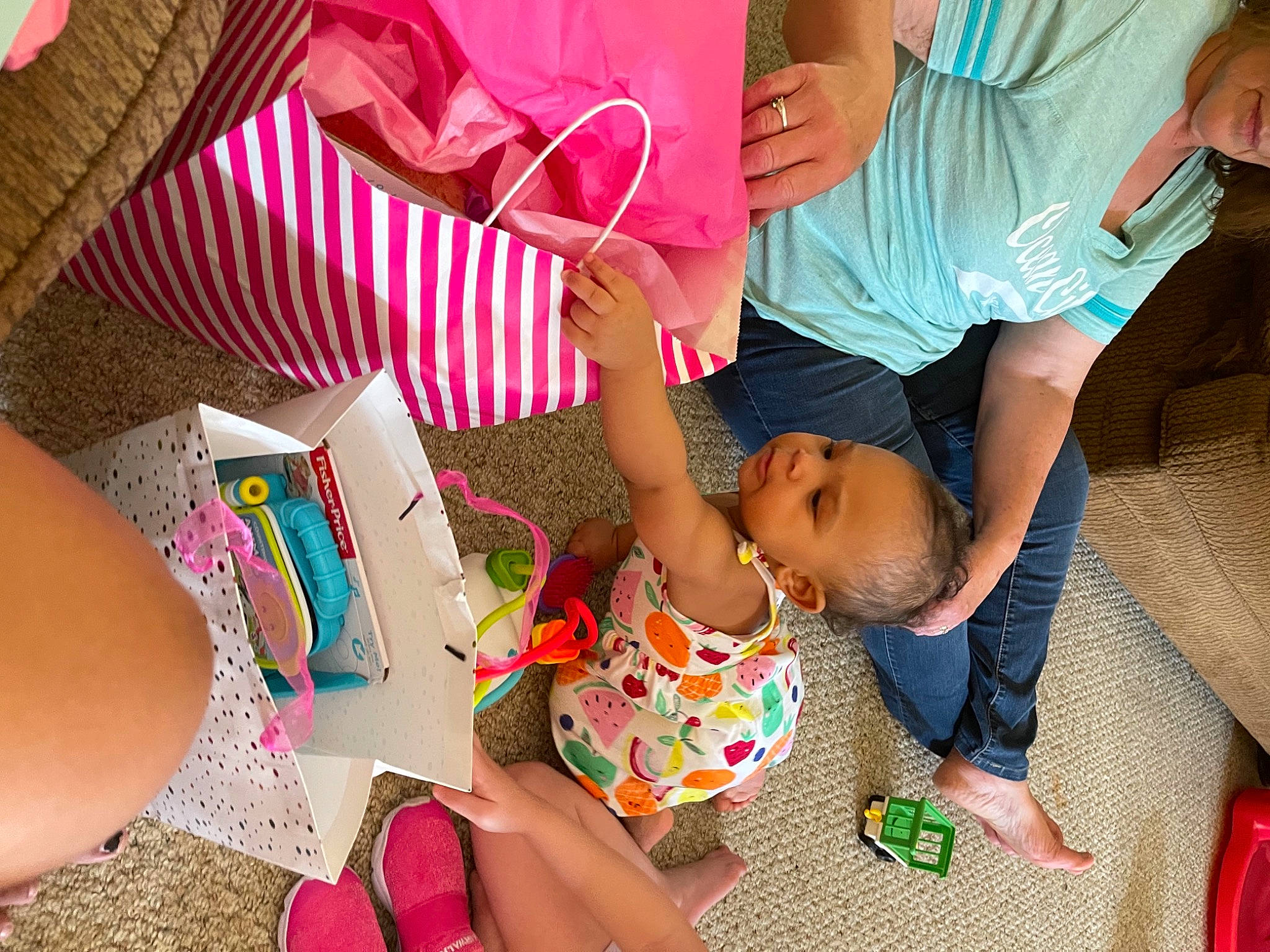 Wynter joined the competition — help win amazing prizes! child, event, finger, friendship, fun, green, happy, leg, leisure, party, pattern, person, pink, recreation, sandal, sharing, shorts, sitting, textile, thigh