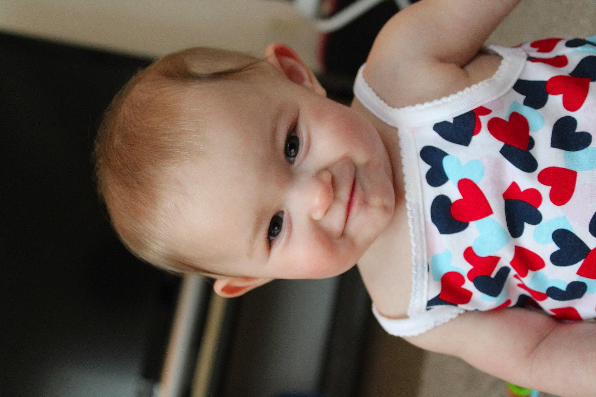 Journee is registered to the contest to win money with this photo: baby, baby_toddler_clothing, carmine, cheek, child, chin, dress, eyelash, finger, flash_photography, fun, happy, joy, lip, mouth, nose, pattern, person, plant, skin