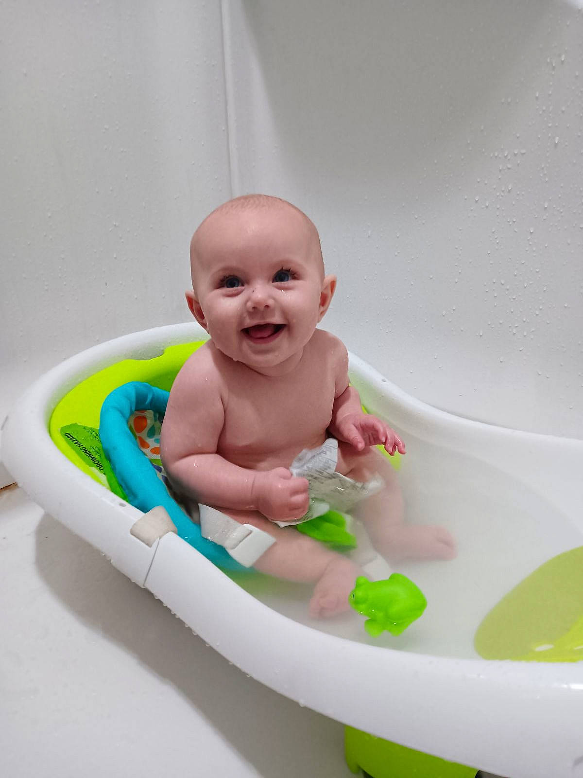 Daphne joined the competition — help win amazing prizes! baby, baby_bathing, baby_playing_with_toys, baby_products, baby_toddler_clothing, baby_toys, bathing, child, circle, comfort, facial_expression, fluid, fun, happy, joy, leisure, person, play, recreation, sitting