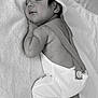 baby, sleeping, infant, hat, blanket, overalls, cute, cozy, soft_texture, peaceful, portrait, child, resting, newborn, indoors, monochrome, black_and_white, close_up, face, skin