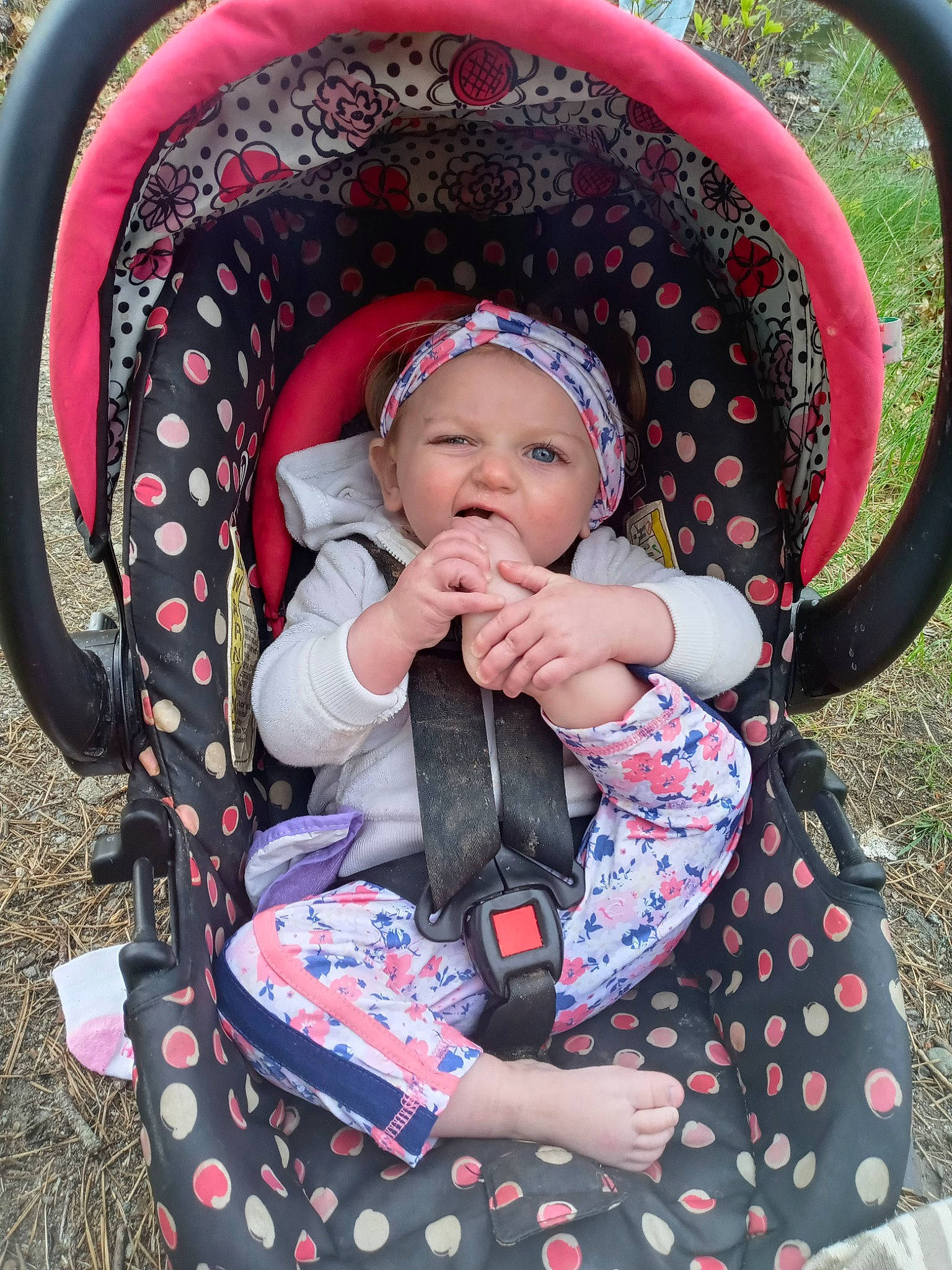 Trinity joined the competition — help win amazing prizes! baby, baby_carriage, baby_toddler_clothing, chair, child, clothing, comfort, eye, face, facial_expression, fun, grass, head, headwear, leisure, people, person, photograph, pink, plant