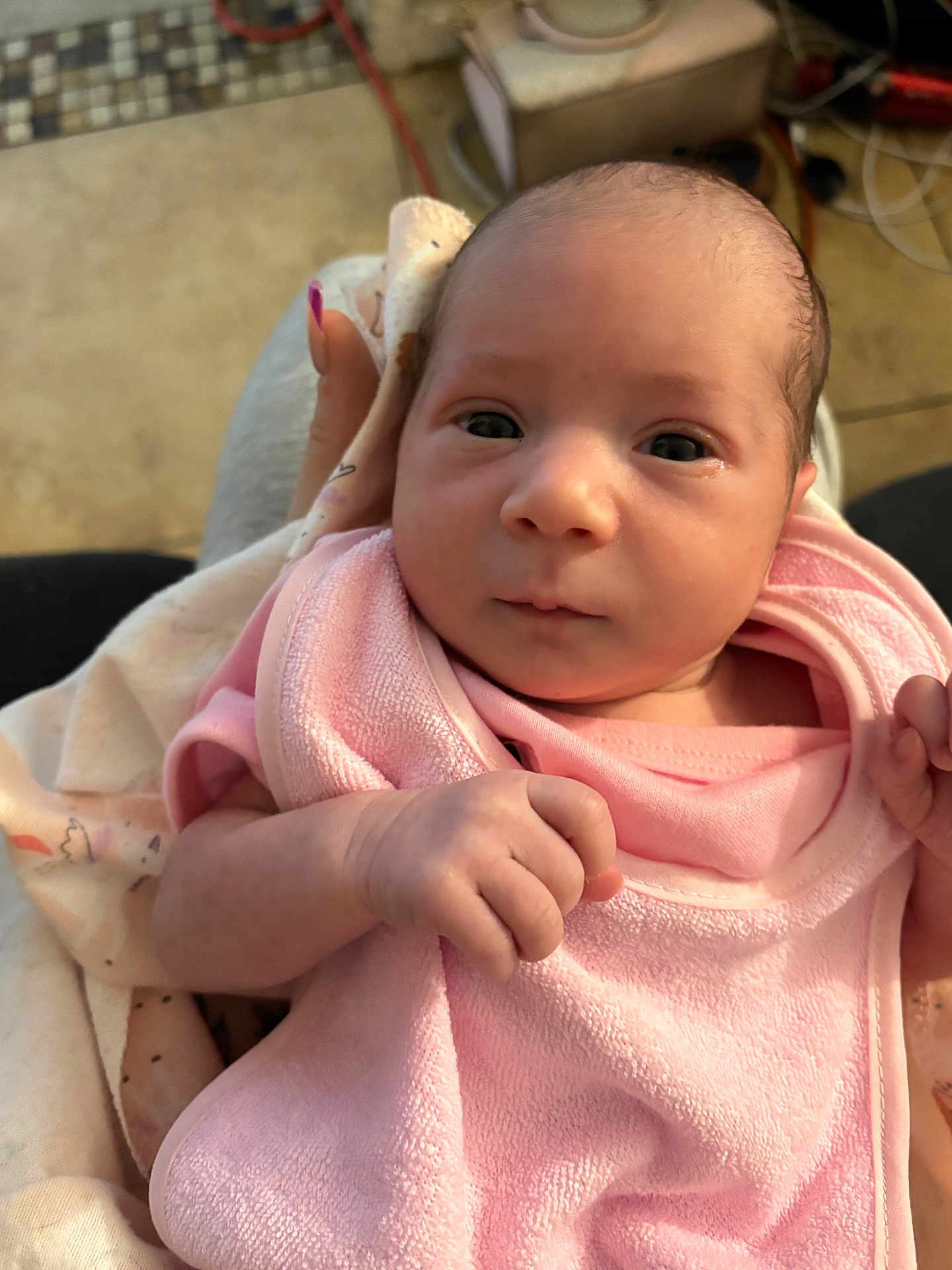 Savannah is registered to the contest to win money with this photo: baby, newborn, infant, pink_towel, hand, face, eyes, blanket, clothing, person, skin, cute, portrait, indoors, young, small, cozy, soft, human, newborn_baby