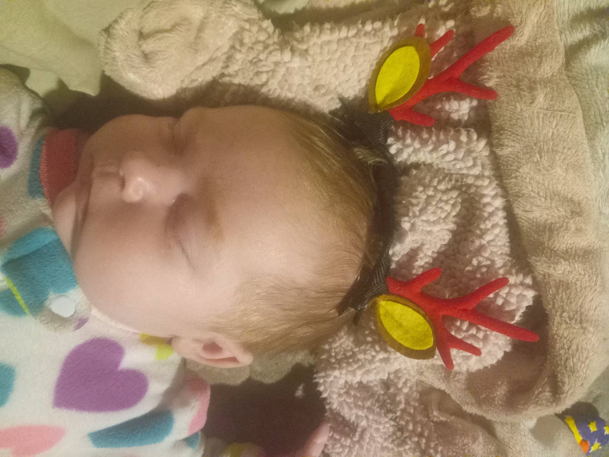 Sophia is registered to the contest to win money with this photo: baby, baby_products, baby_toddler_clothing, baby_toys, cheek, child, close_up, eye, hand, happy, head, iris, linens, lip, nose, person, product, skin, textile, toddler