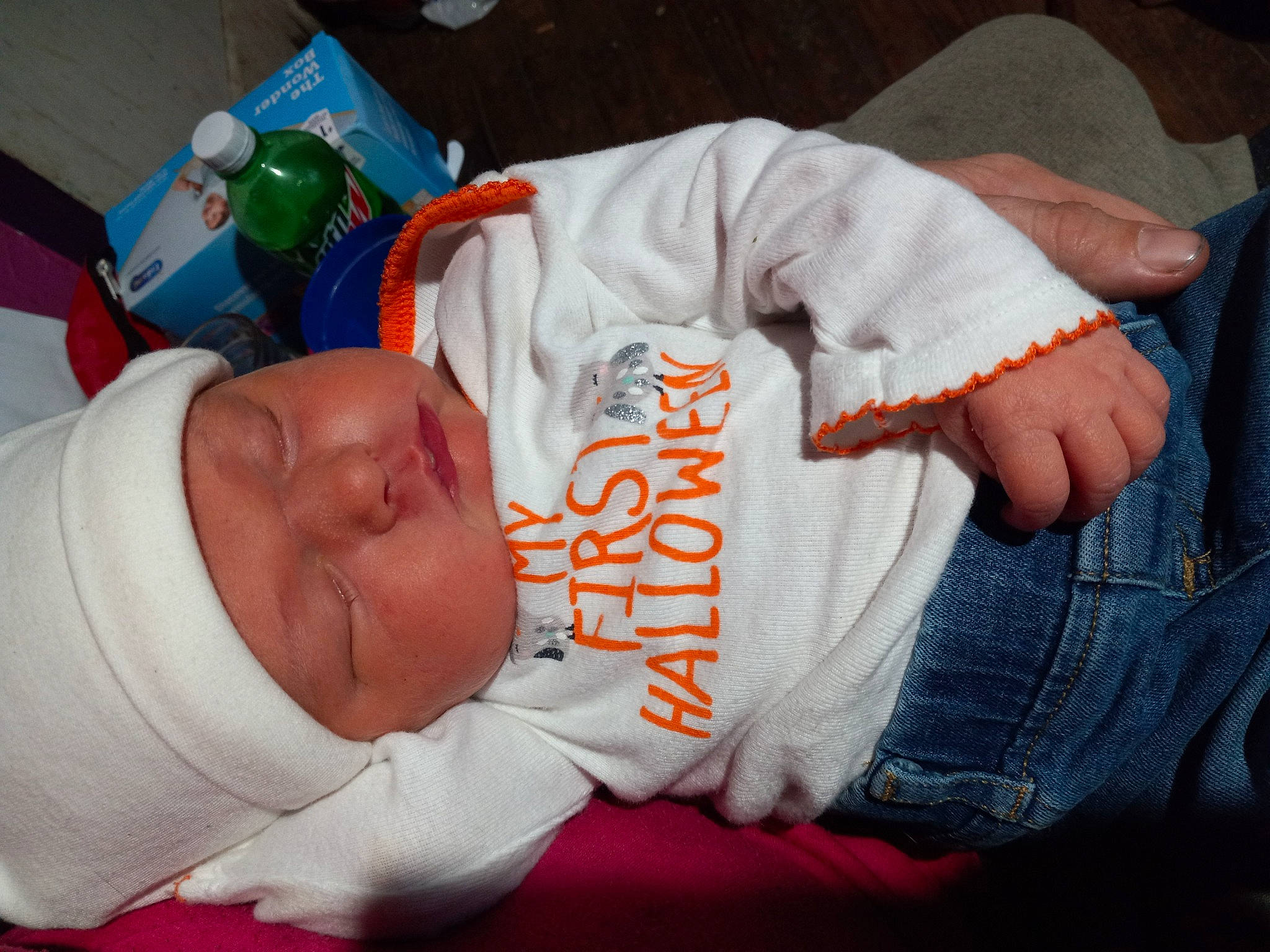 Sophia is registered to the contest to win money with this photo: abdomen, baby, baby_products, baby_toddler_clothing, child, comfort, denim, elbow, finger, gesture, headwear, human_leg, knee, nap, person, room, sitting, sleep, sleeve, toddler