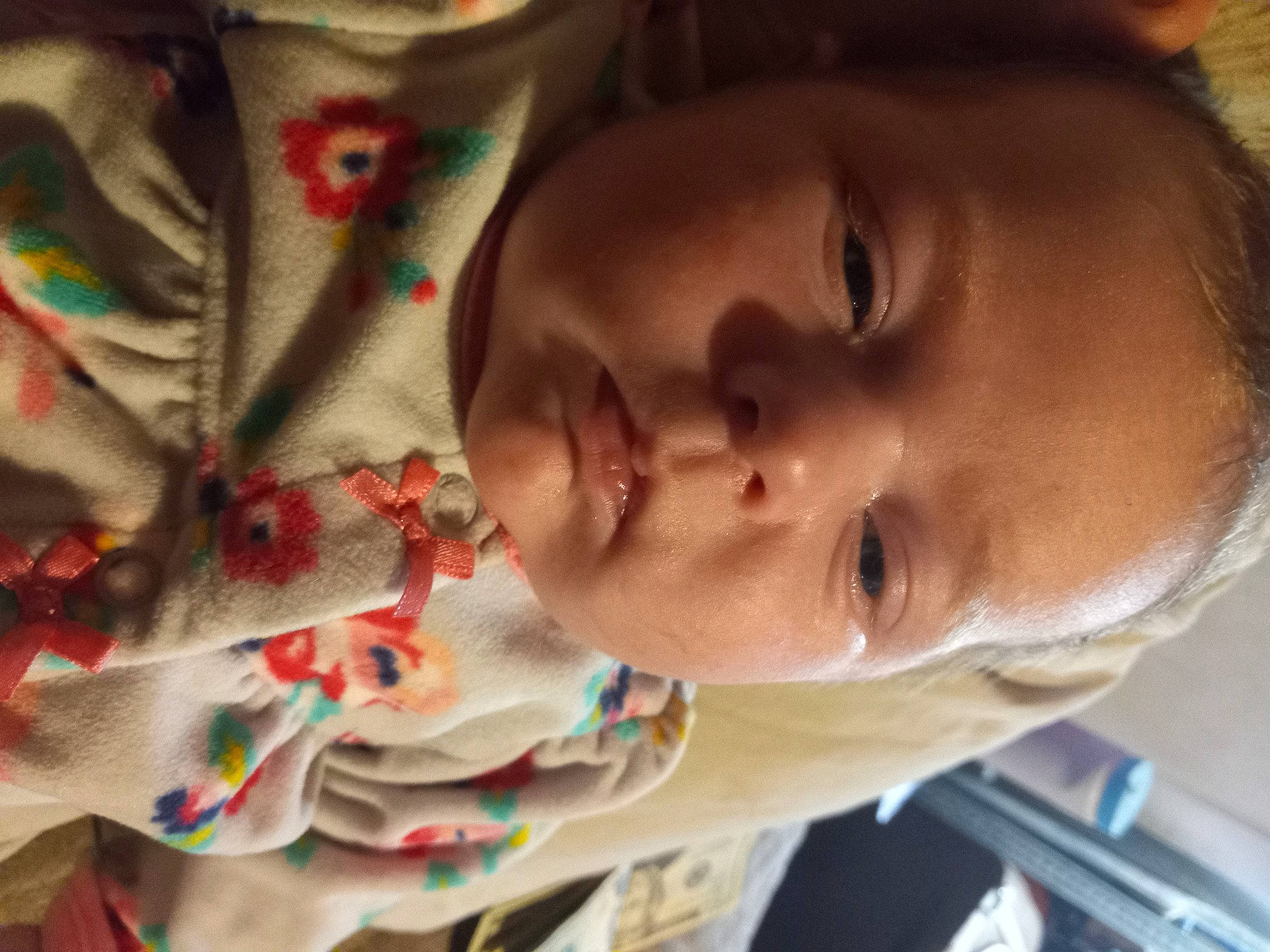 Sophia is registered to the contest to win money with this photo: baby, baby_toddler_clothing, cheek, child, close_up, comfort, eye, eyebrow, eyelash, forehead, happy, iris, lip, mouth, neck, nose, person, skin, sleeve, smile