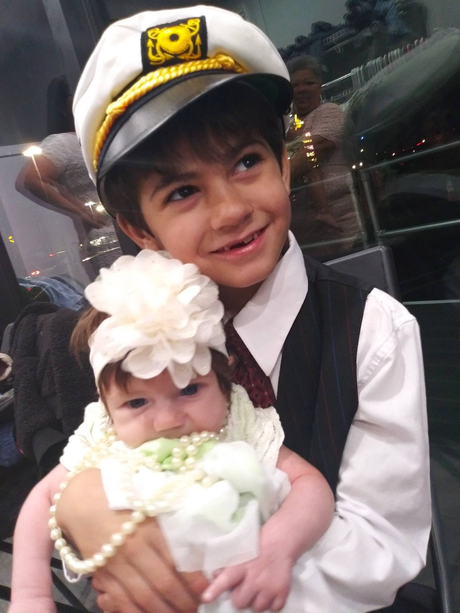 Karma is registered to the contest to win money with this photo: child, happy, headgear, headwear, joy, person, smile, toddler, under_exposed