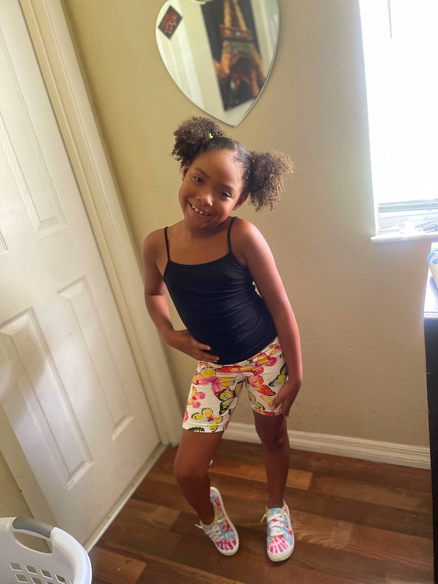 Alyssa is registered to the contest to win money with this photo: abdomen, active_pants, active_tank, calf, chest, door, elbow, flooring, joy, knee, leg, mirror, person, shorts, shoulder, sportswear, tableware, thigh, toddler, trunk