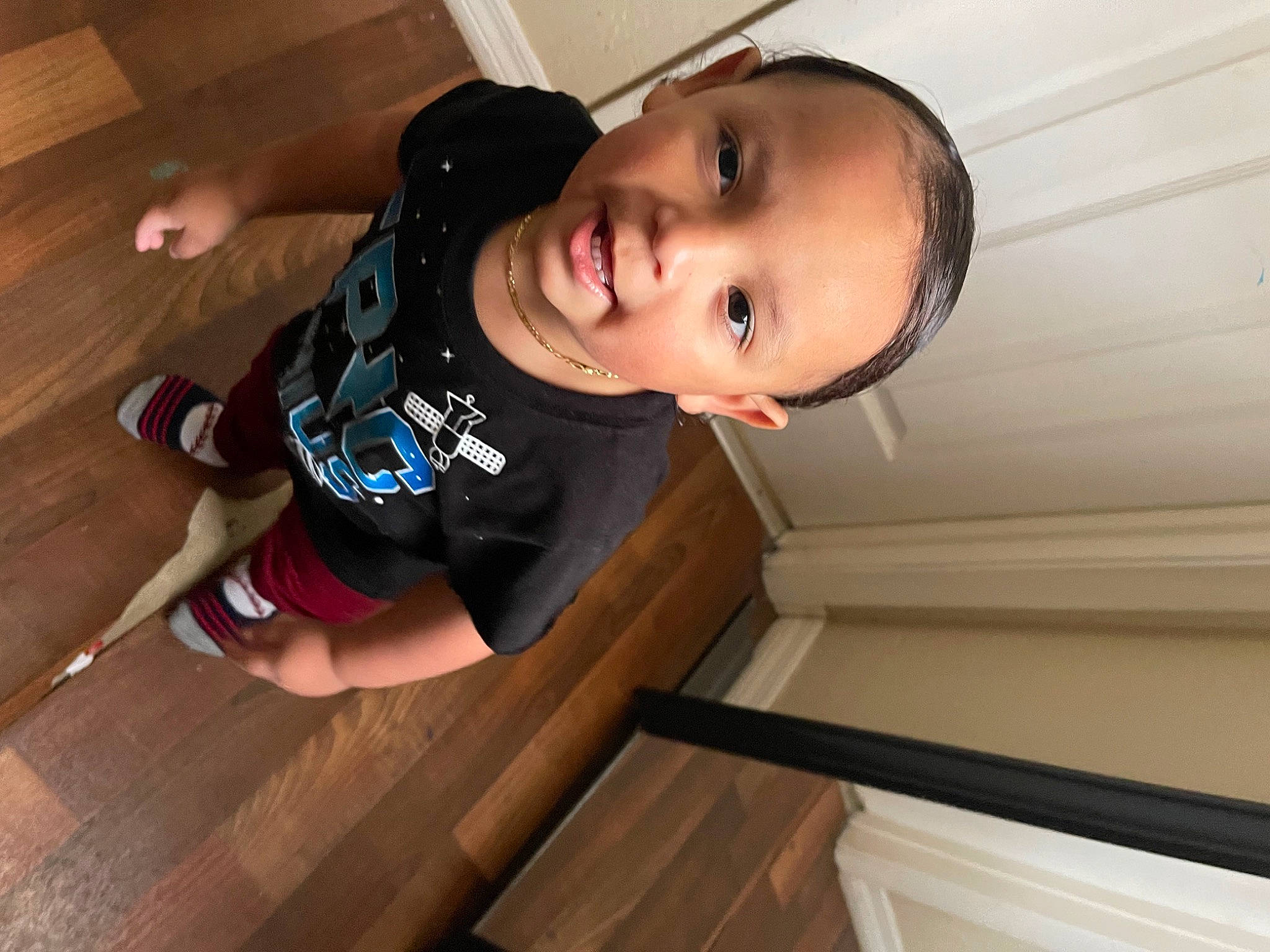 Aiden joined the competition — help win amazing prizes! baby_toddler_clothing, elbow, face, flash_photography, flooring, fun, happy, hardwood, hat, human_leg, nose, person, sleeve, smile, stairs, thigh, toddler, varnish, window, wood