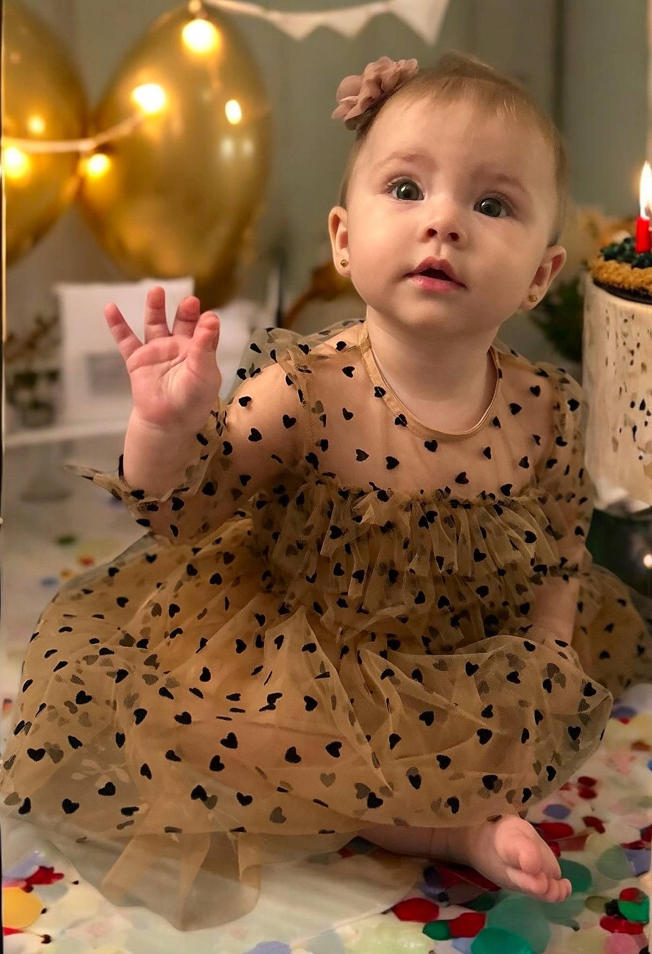 Salma is registered to the contest to win money with this photo: baby, birthdaycake, bodypart, cake, candle, clothing, cream, dessert, face, finger, food, fun, hand, head, party, people, person, photography, portrait, sitting