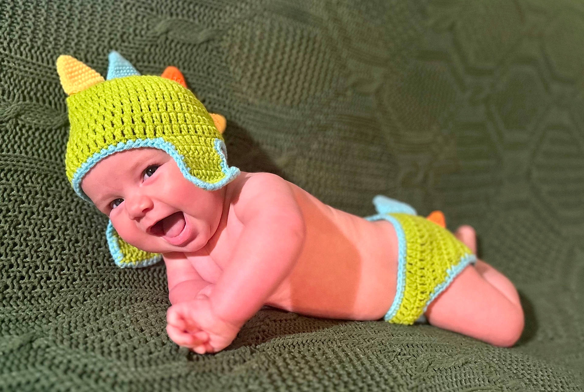 Lennon is registered to the contest to win money with this photo: baby, babylaughing, beanie, bonnet, cap, clothing, face, happy, hat, head, hosiery, newborn, person, photography, portrait, smile, sock