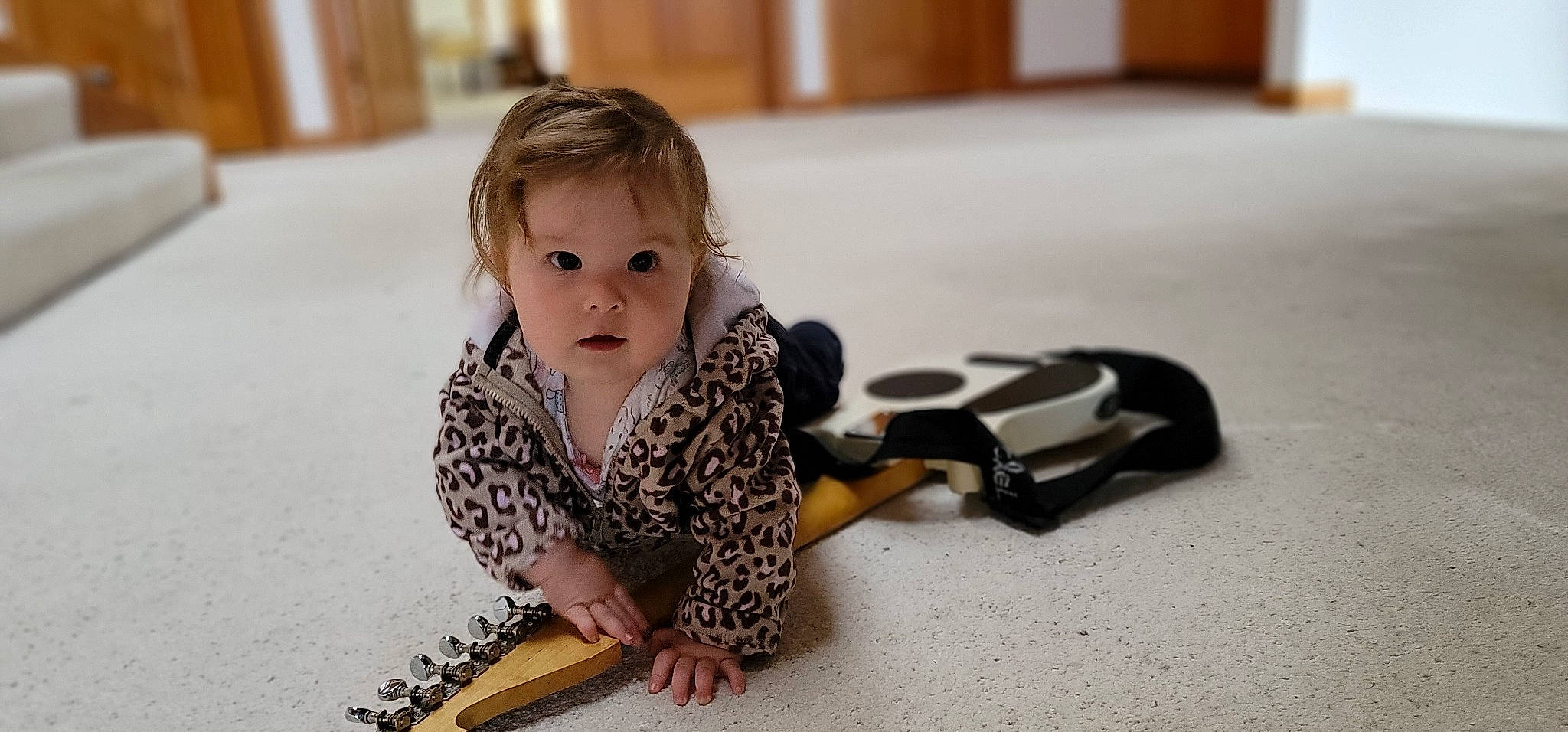 Mystic is registered to the contest to win money with this photo: baby, baby_products, baby_toddler_clothing, child, crawling, flooring, fun, hairstyle, happy, hardwood, head, pattern, person, play, portrait_photography, room, sitting, skin, toddler, toy