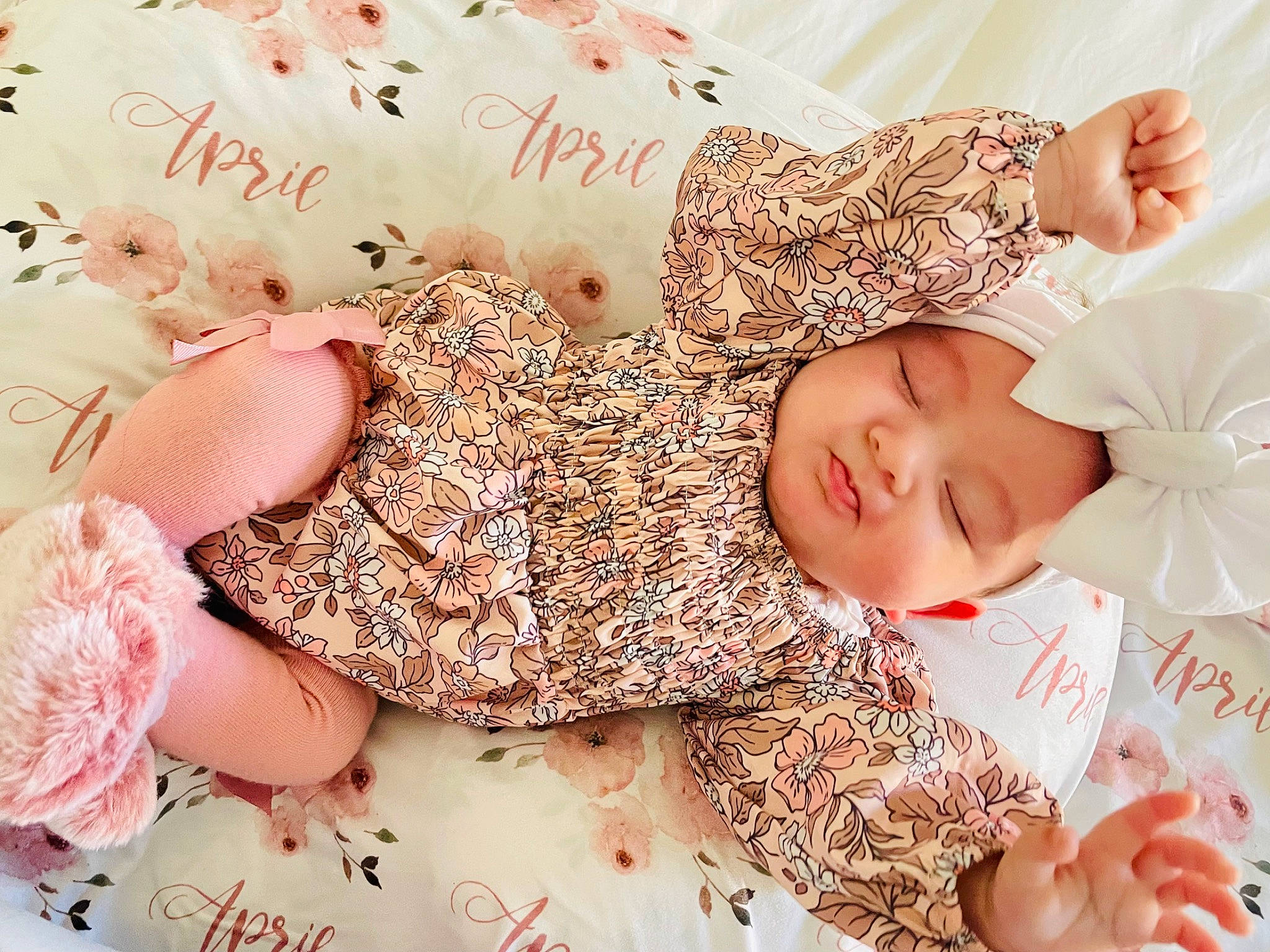 April joined the competition — help win amazing prizes! arm, baby_toddler_clothing, child, comfort, dress, event, finger, gesture, hand, happy, headwear, nail, pattern, people_in_nature, person, pink, skin, sleeve, smile, textile