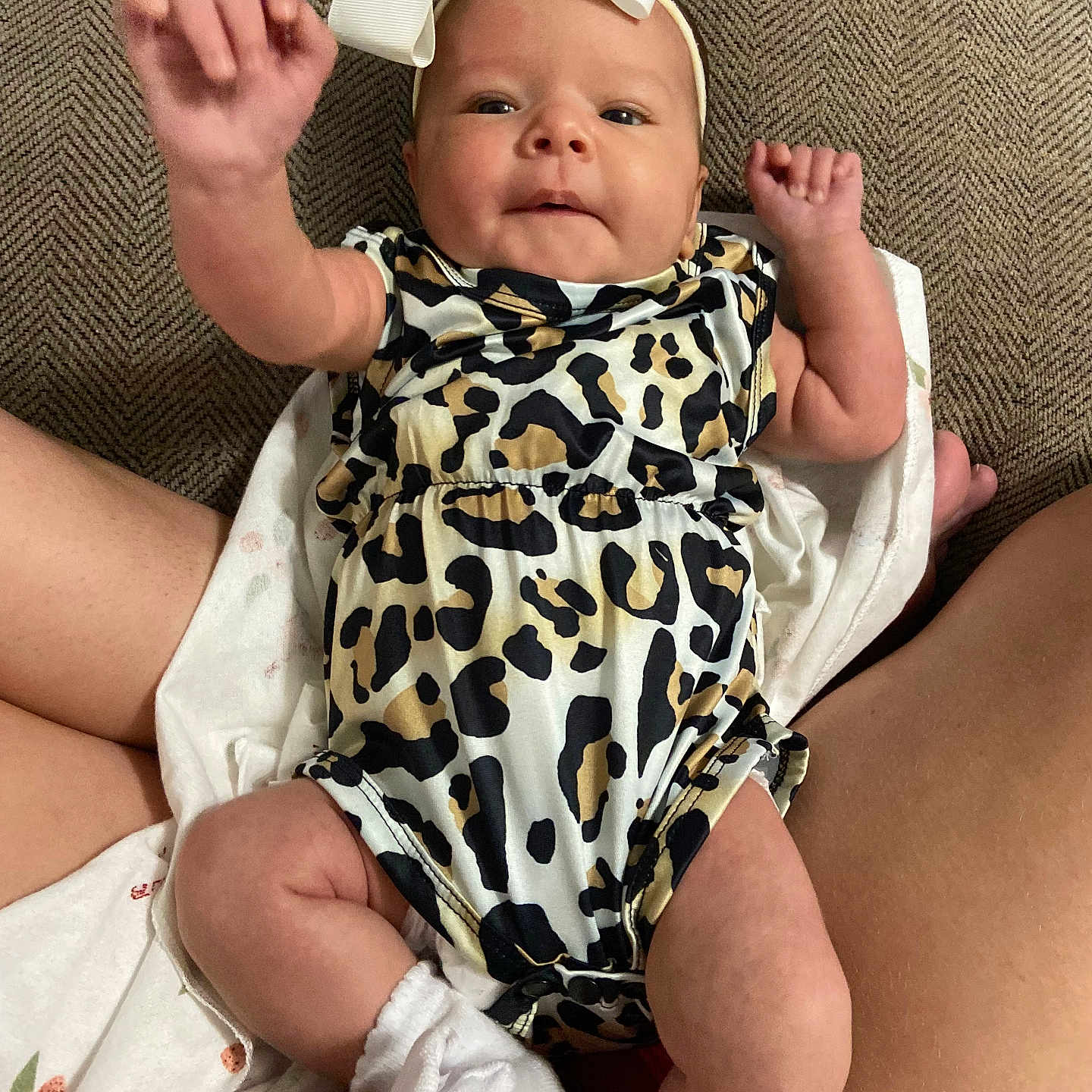 Audrey is registered to the contest to win money with this photo: baby, bodypart, cap, clothing, couch, cushion, dress, face, finger, furniture, glove, hand, hat, head, homedecor, newborn, person, photography, portrait, shorts