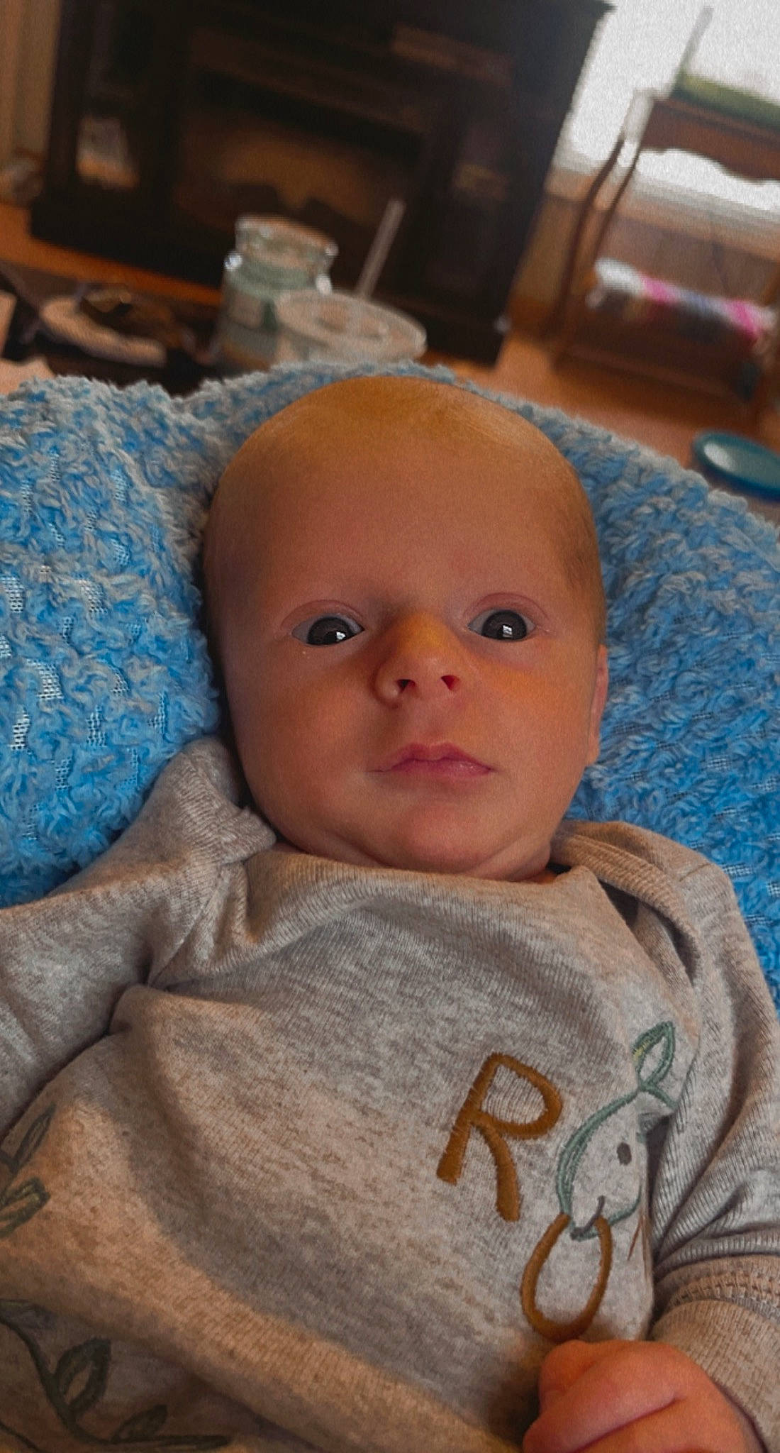 Kolson joined the competition — help win amazing prizes! baby, baby_toddler_clothing, bedding, chair, cheek, child, comfort, eye, eyebrow, eyelash, face, iris, linens, nose, person, sitting, skin, sleeve, smile, toddler