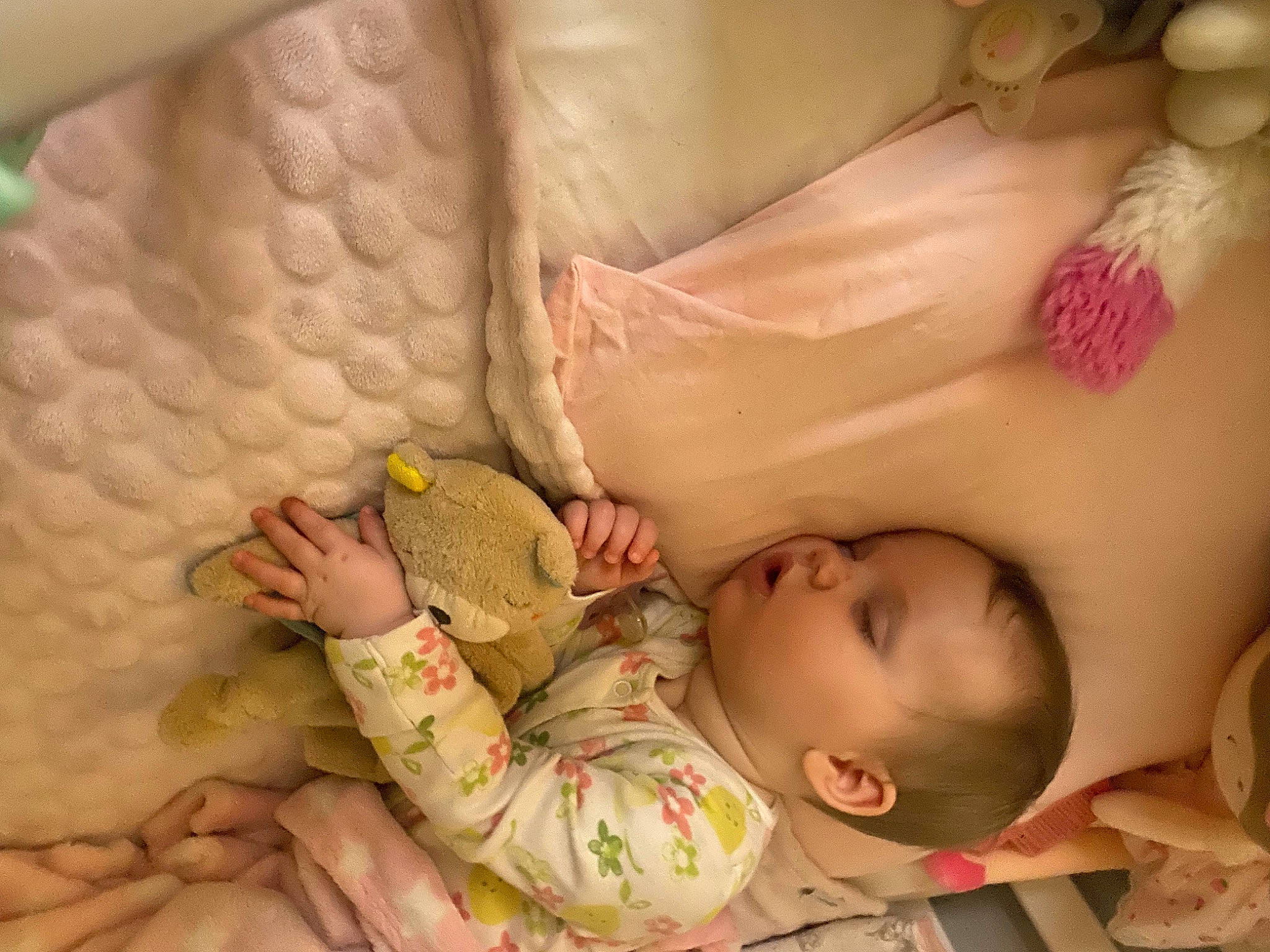 April is registered to the contest to win money with this photo: baby, baby_safety, baby_sleeping, baby_toddler_clothing, bed, cheek, child, comfort, eyelash, finger, hand, human_body, linens, mouth, nail, nose, person, skin, textile, toddler