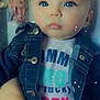 baby, child, blue_eyes, denim_jacket, shirt, long_eyelashes, face, cute, portrait, sparkles, glowing_stars, indoor, person, clothing, hand, skin, infant, adorable, young, expression