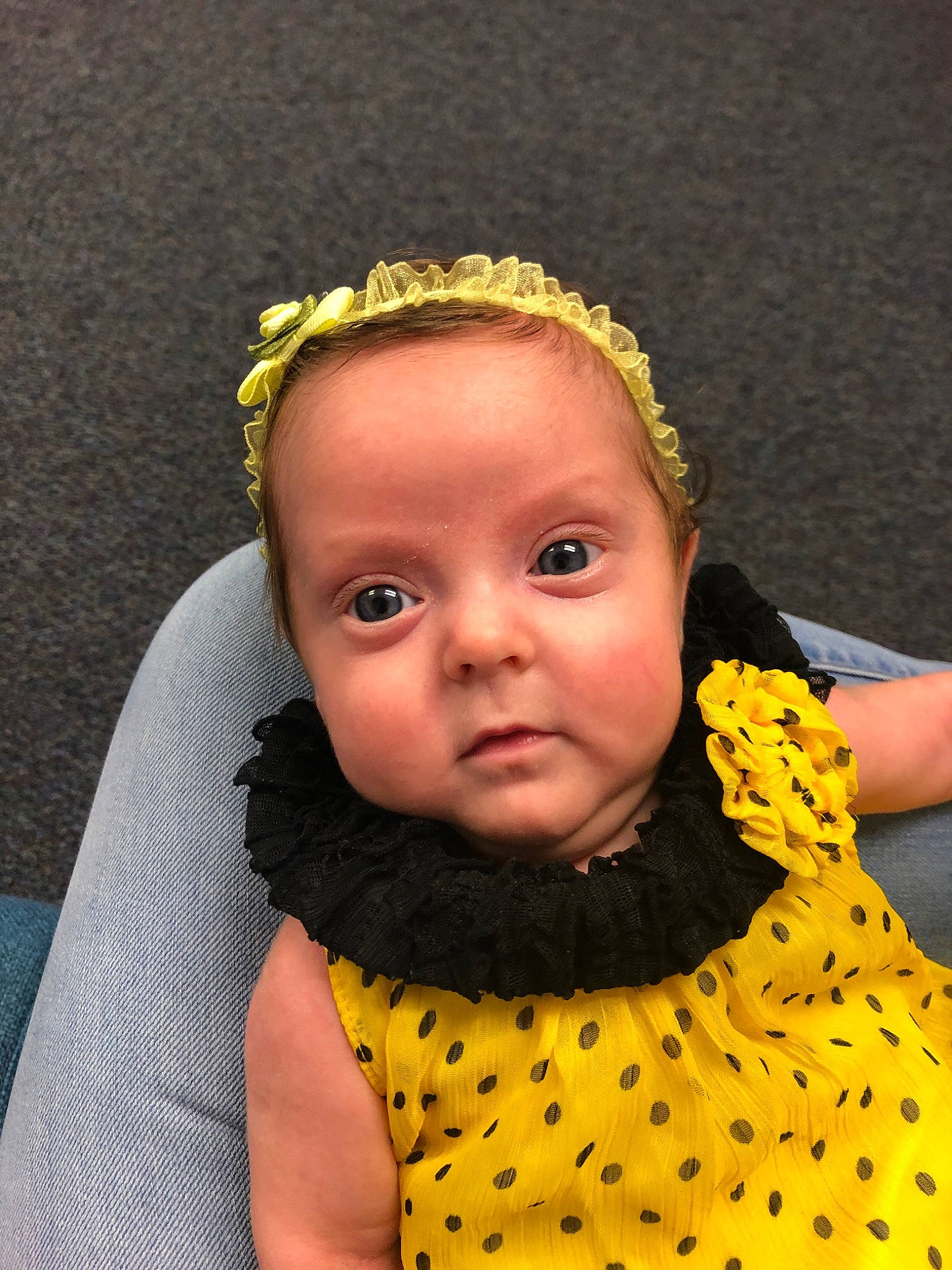 Marlow joined the competition — help win amazing prizes! baby, cheek, child, face, fashion_accessory, forehead, hair_accessory, head, headband, headgear, headpiece, outerwear, person, smile, toddler, yellow