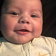 Scooter joined the competition — help win amazing prizes! baby, smiling, face, infant, closeup, child, apparel, nike_logo, cute, portrait, happy, young, skin, eyes, clothing, zipper, indoors, head, person, babywear