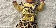 Delilah Rose Knight joined the competition — help win amazing prizes! baby, baby_girl, bed, bow, child, clothing, cute, indoor, infant, infant_girl, leopard_print, lying_down, newborn, pacifier, patterned_pants, person, sleepwear, soft_texture, white_bedspread, yellow_clothing