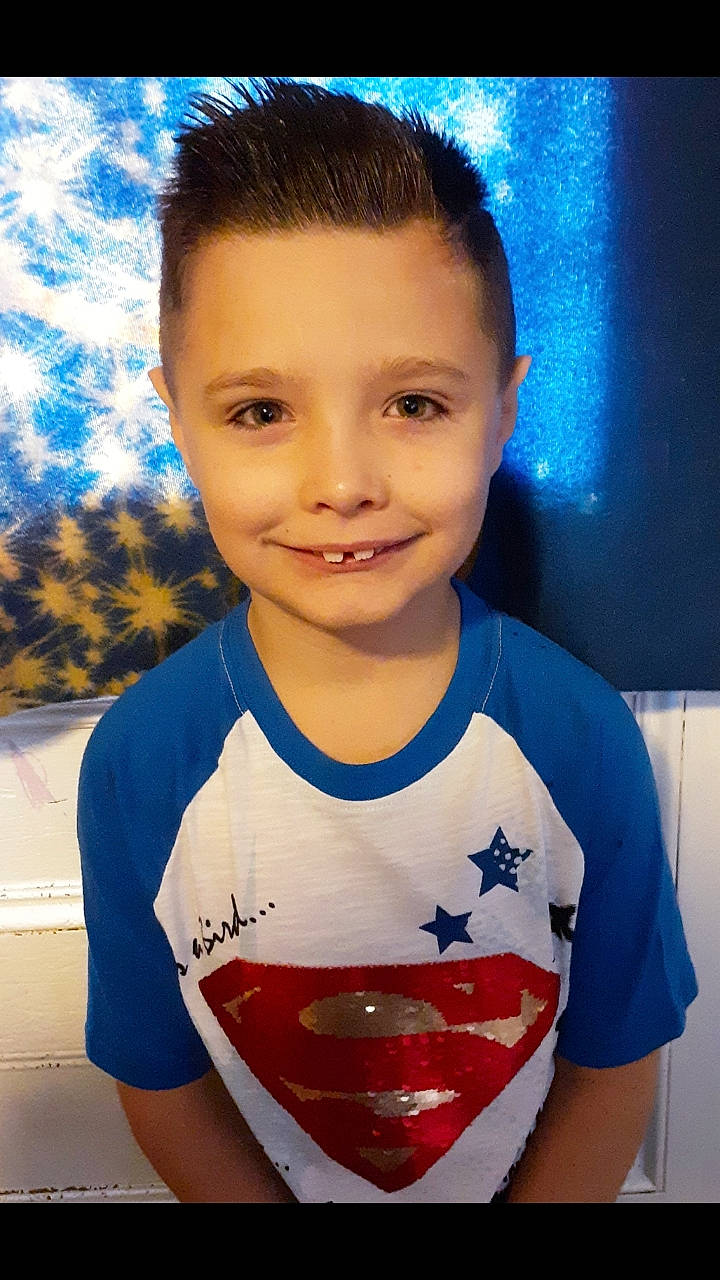 Brenden is registered to the contest to win money with this photo: cheek, child, face, forehead, head, joy, neck, person, smile, t_shirt, toddler