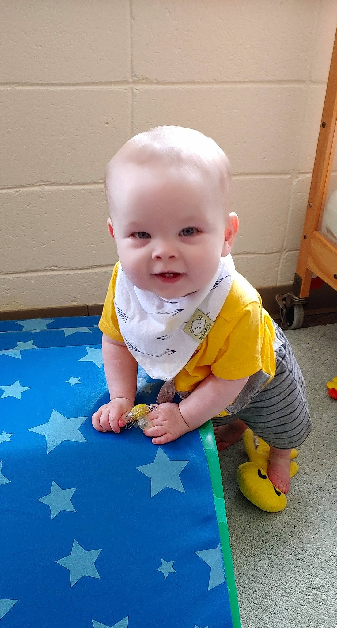 Caiden joined the competition — help win amazing prizes! baby, baby_toddler_clothing, child, crawling, floor, flooring, person, play, product, sitting, skin, smile, toddler, tummy_time, yellow